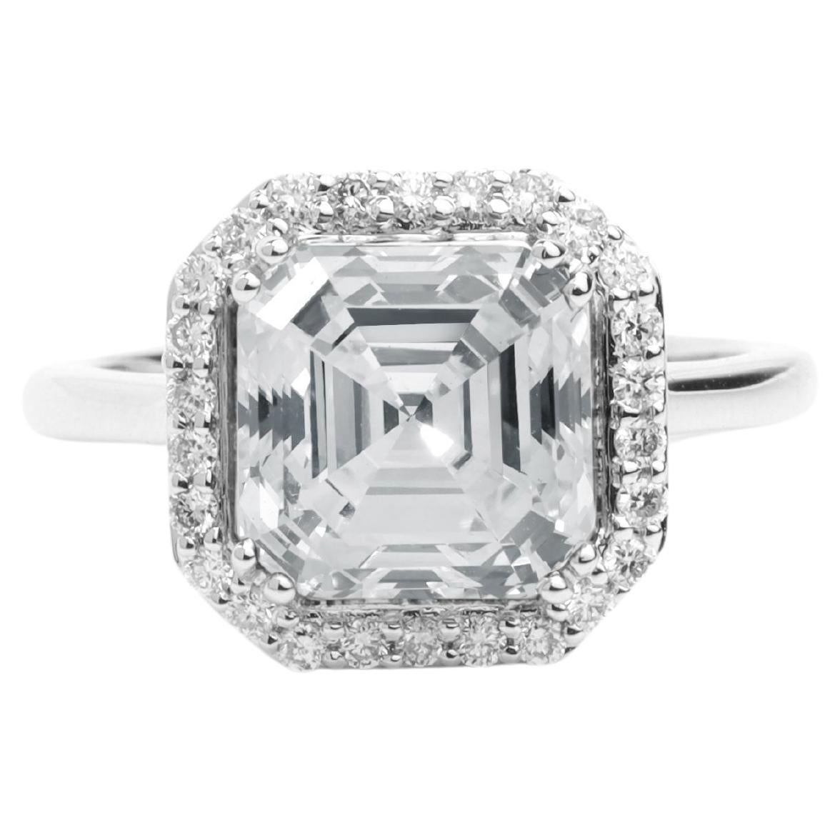 GIA Report Certified 4 Carat H VS Asscher Cut Diamond 18k Halo Engagement Ring For Sale