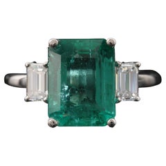 Certified 3.79 Carat Emerald and Diamond White Gold Engagement Three-Stone Ring