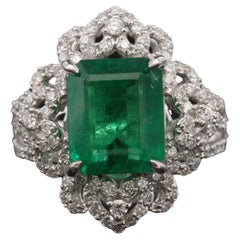 GIA Report Certified 4.48 Carat Emerald and Diamond White Gold Engagement Ring