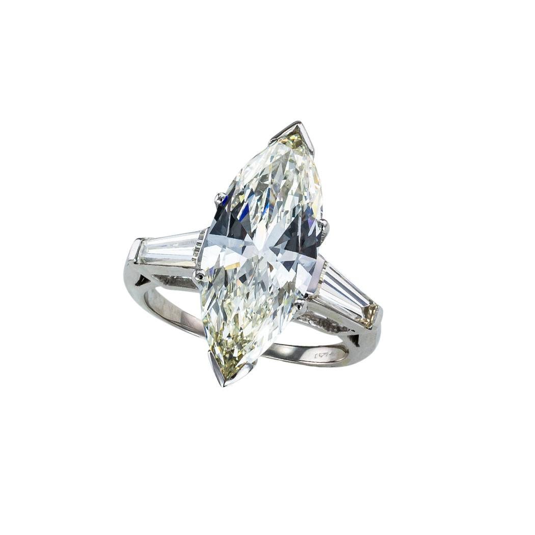 GIA report certified 4.63-carats marquise-shaped diamond solitaire and platinum engagement ring circa 1950.  

The facts you want to know are listed below.  Read on.  It is remarkably short, simple, and clear. 

Do contact us right away if you have