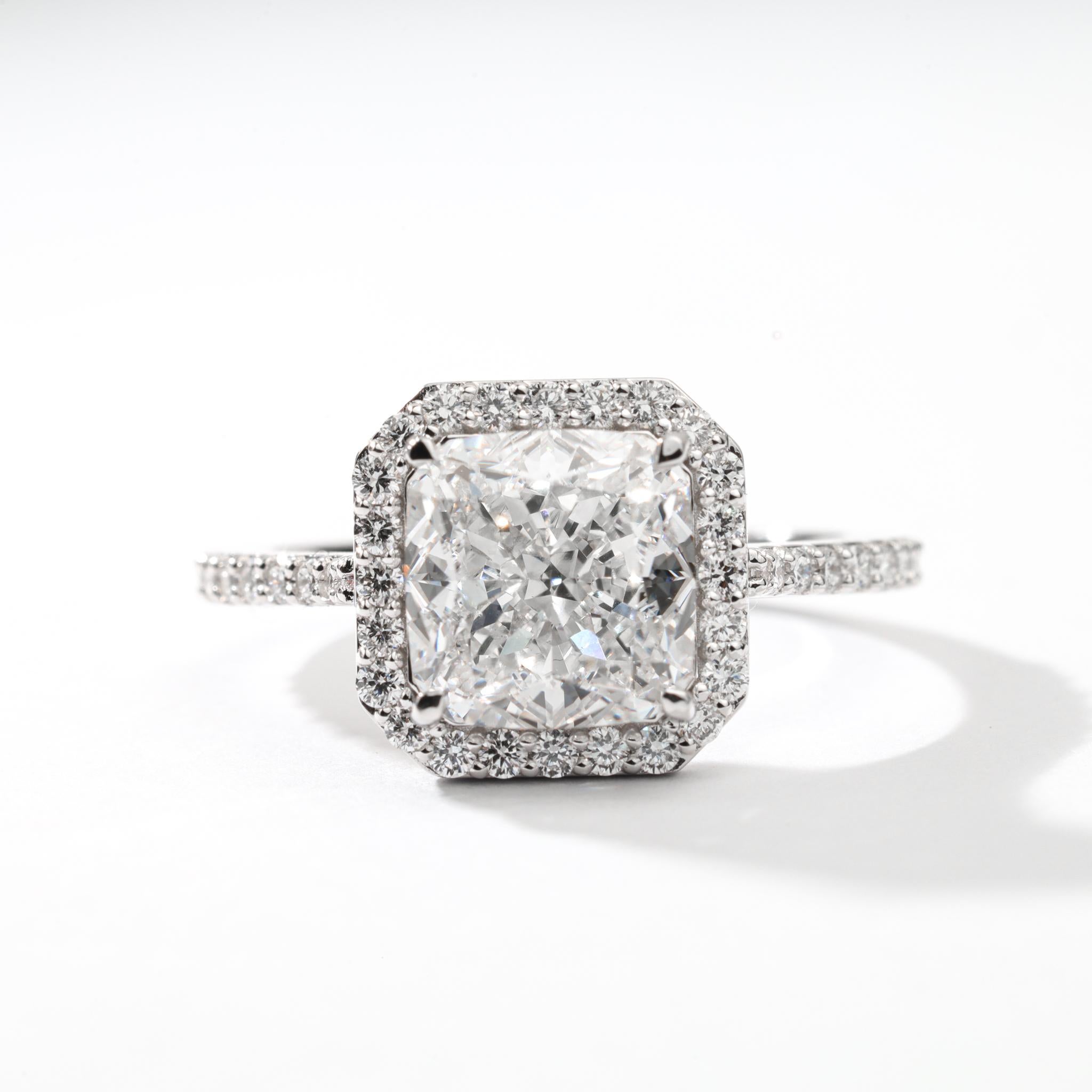 GIA Report Certified Cushion Cut F VS, 3 Carat Diamond Halo Engagement Ring

Available in 18k White gold.

Same design can be made also with other custom gemstones per request.

Product details:

- Solid gold (18k White)

- Main stone - GIA Report