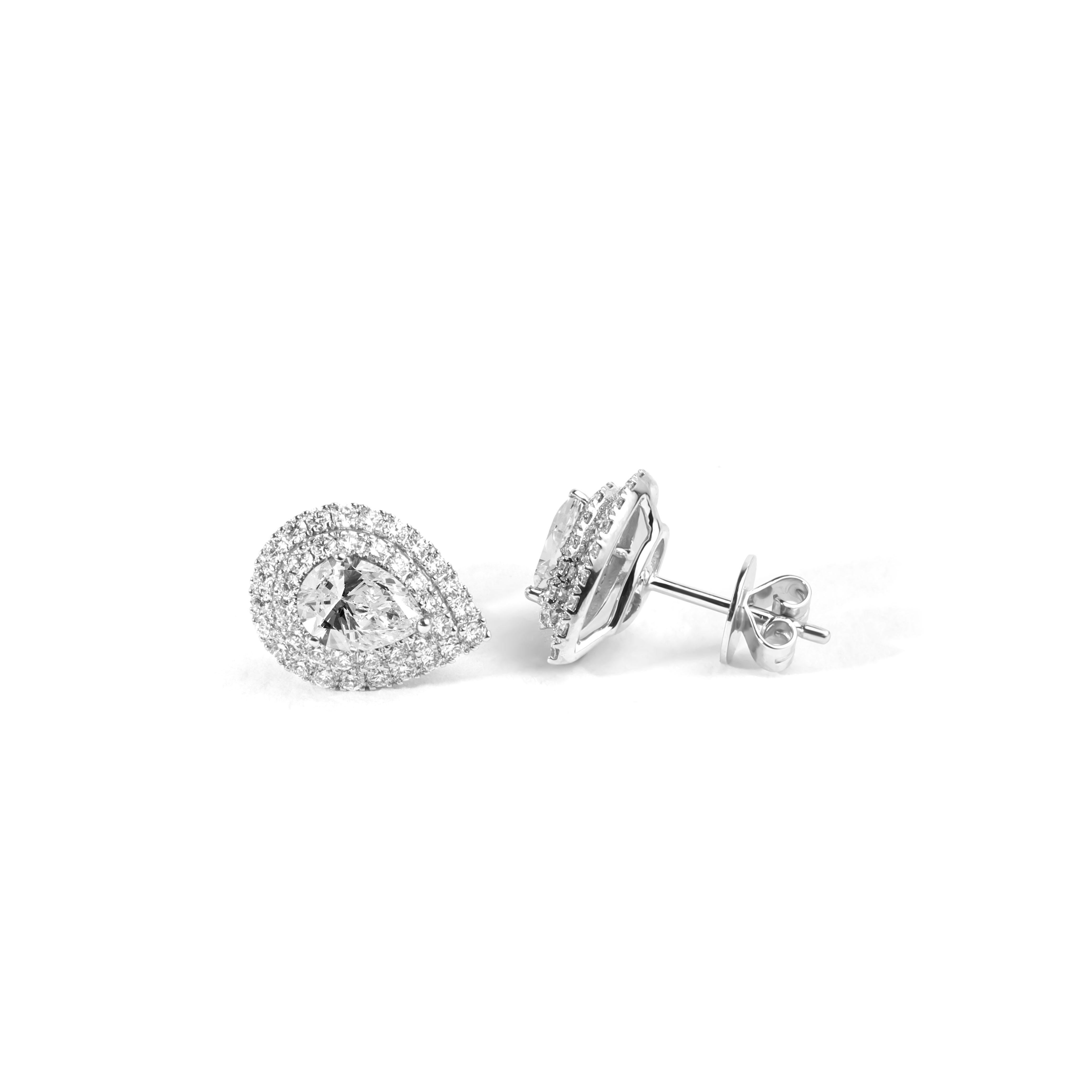 GIA Report Certified Diamond Double Halo Pear Cut Stud Earrings, 18k white gold

Available in 18k white gold.

Same design can be made also with other custom gemstones per request.

Product details:

- Solid gold 3 grams

- 0.90 carat Oval diamond