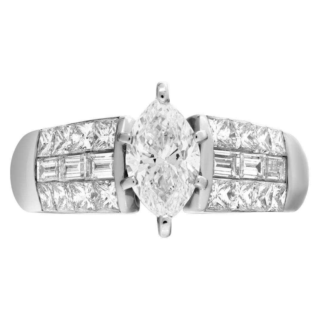 GIA report certified Marquise diamond 1.01 ct (D Color, SI1 Clarity) set in 18k white gold setting with approx. 1 ct in baguettes and princess cut diamonds; size 8. This GIA report certified ring is currently size 8 and some items can be sized up or