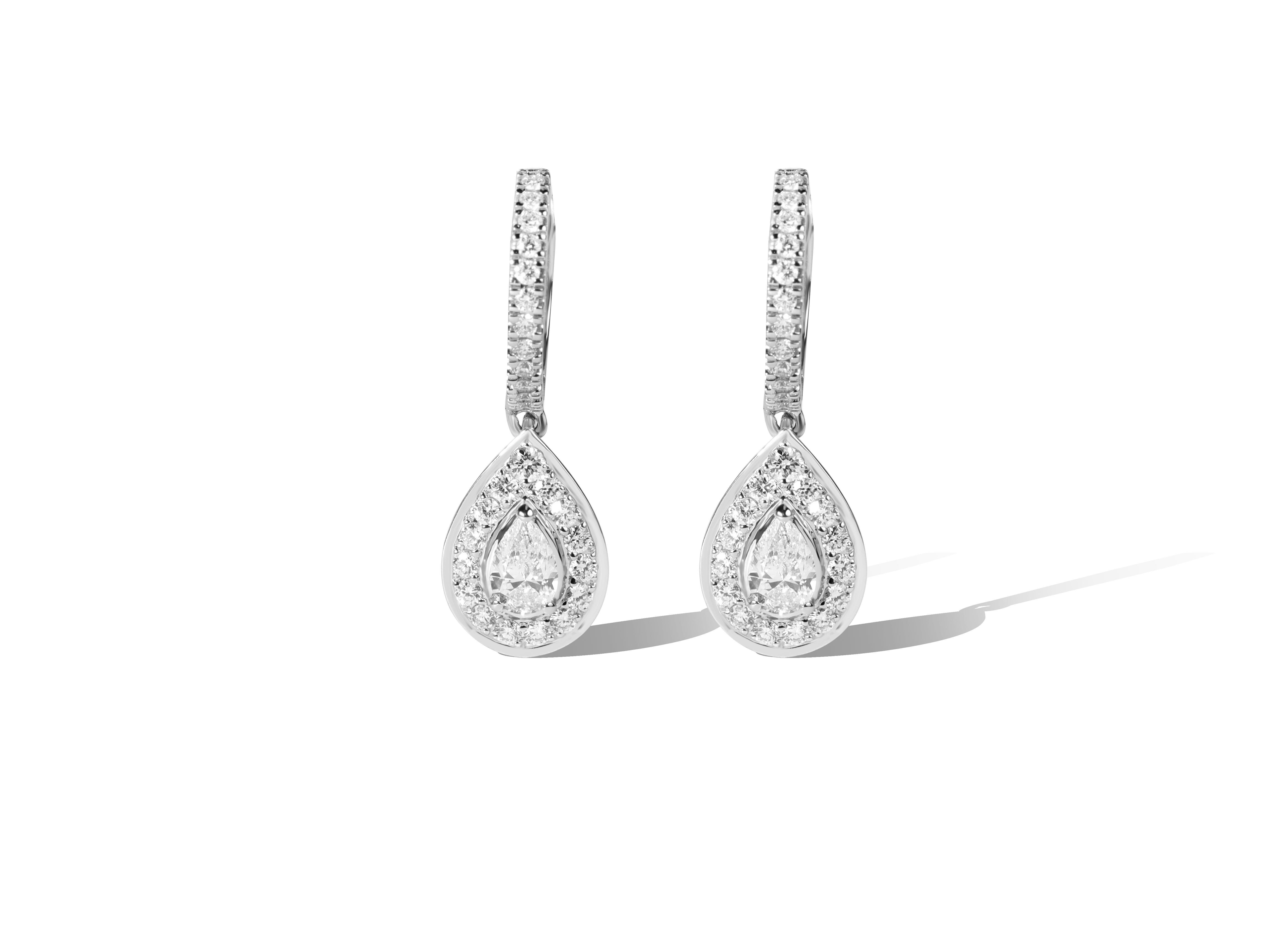 GIA Report Certified E VVS Diamond Teardrop Pear Cut Halo Dangle Earrings  

Available in 18k white gold.

Same design can be made also with other custom gemstones per request.

Product details:

- Solid gold (approx. 3.9 grams)

- GIA 0.3 carat