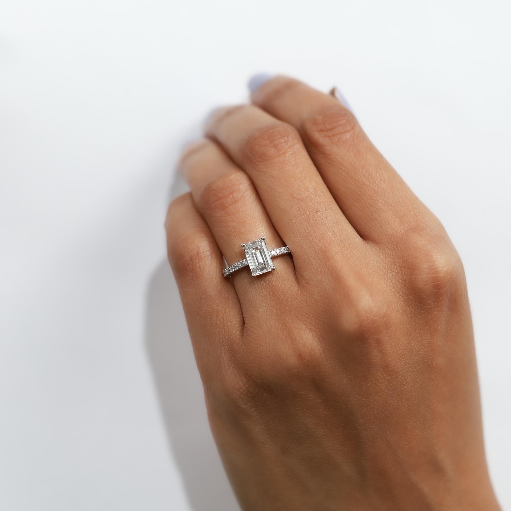 Product Details:

💎 Main Stone:

Type: Natural Diamond

Shape: Emerald Cut

Carat Weight: 2.00 ct

Dimensions: Approx. 8 x 10 mm

Color Grade: E (Exceptional white)

Clarity Grade: VS1 (Very Slightly Included 1)

Certification: GIA Certified

💎