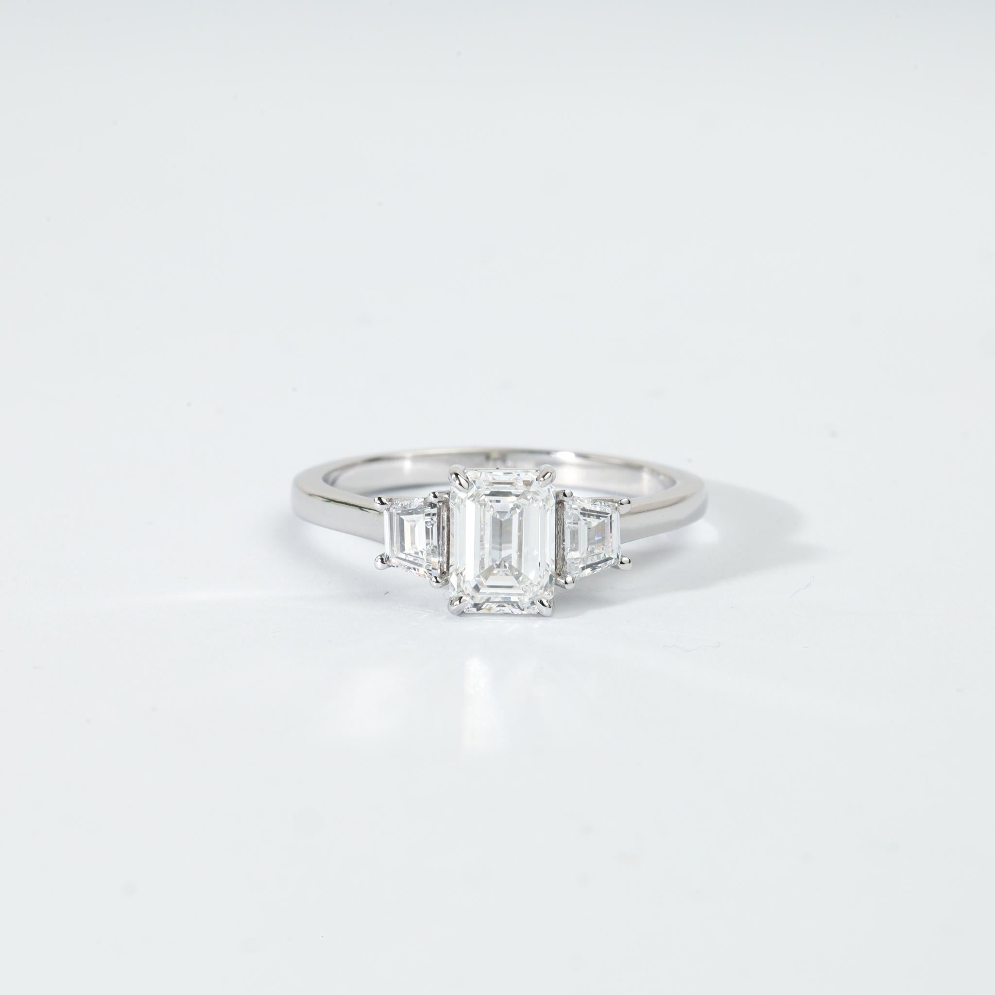 GIA Report Certified Emerald Cut E VS, 1 carat Diamond Ring 18k White Gold 

Available in 18k White gold.

Same design can be made also with other custom gemstones per request.

Product details:

- Solid gold (18k White)

- Main stone - GIA Report