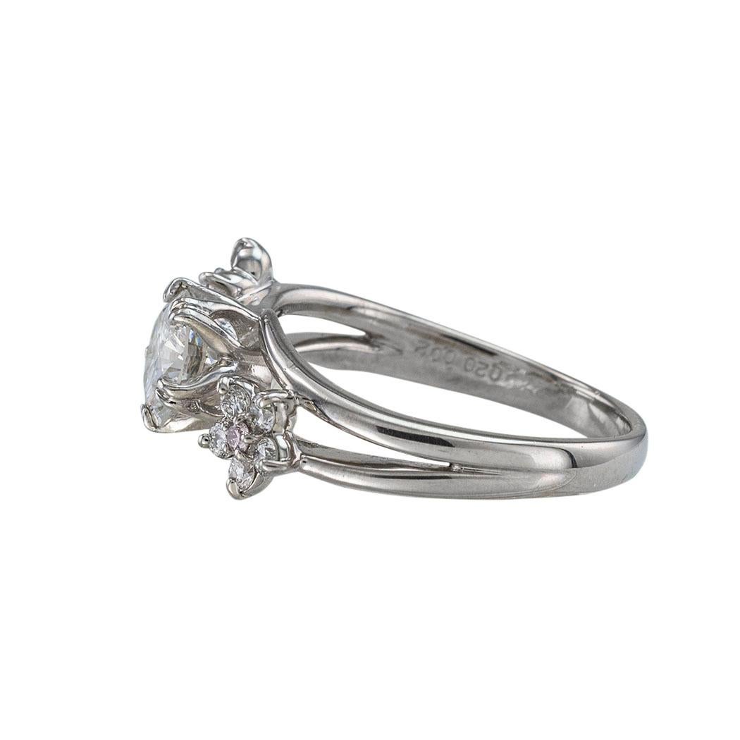 0.85 carat diamond ring on finger