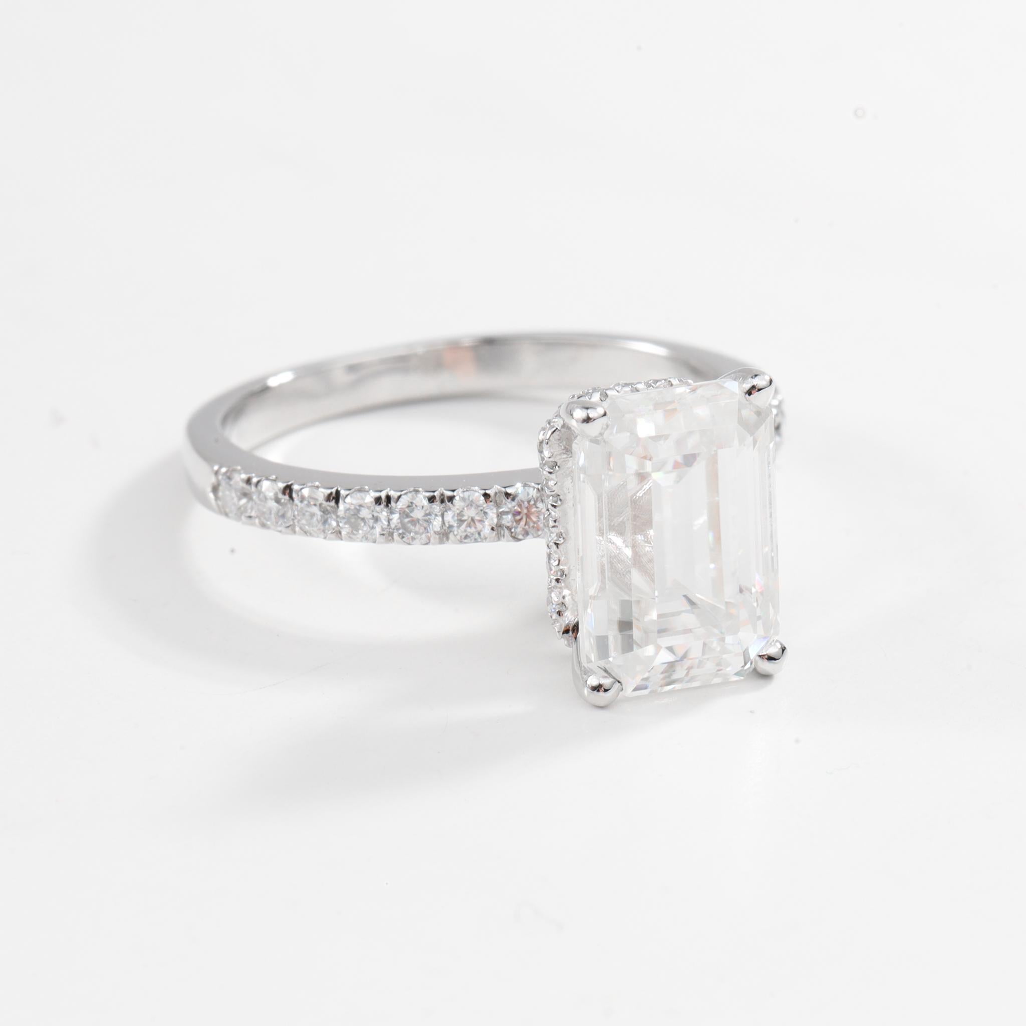 GIA Report Certified G VS2 3 Carat Emerald Cut Diamond Engagement Ring

Available in 18k white gold.

Same design can be made also with other custom gemstones per request.

Product details:

- Solid gold

-  Side Diamond - approx. 0.33 carat

- Main