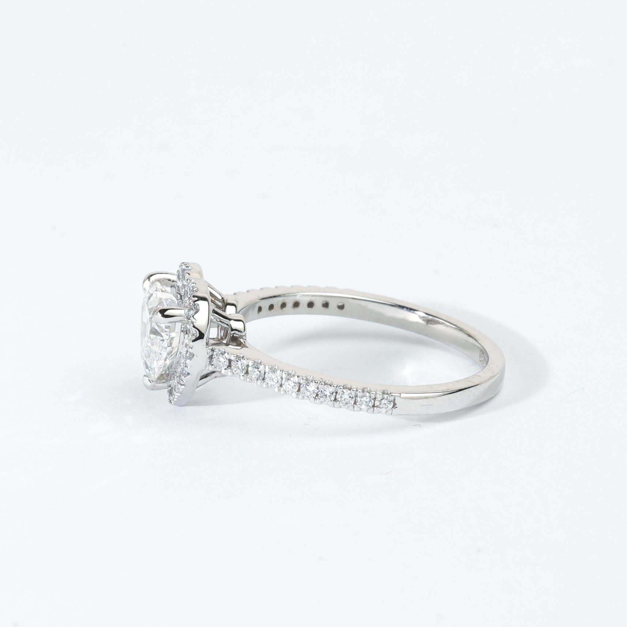 GIA Report Certified Heart Cut E VS 1 Carat Diamond Halo Ring in 950 Platinum In New Condition For Sale In Jaipur, RJ