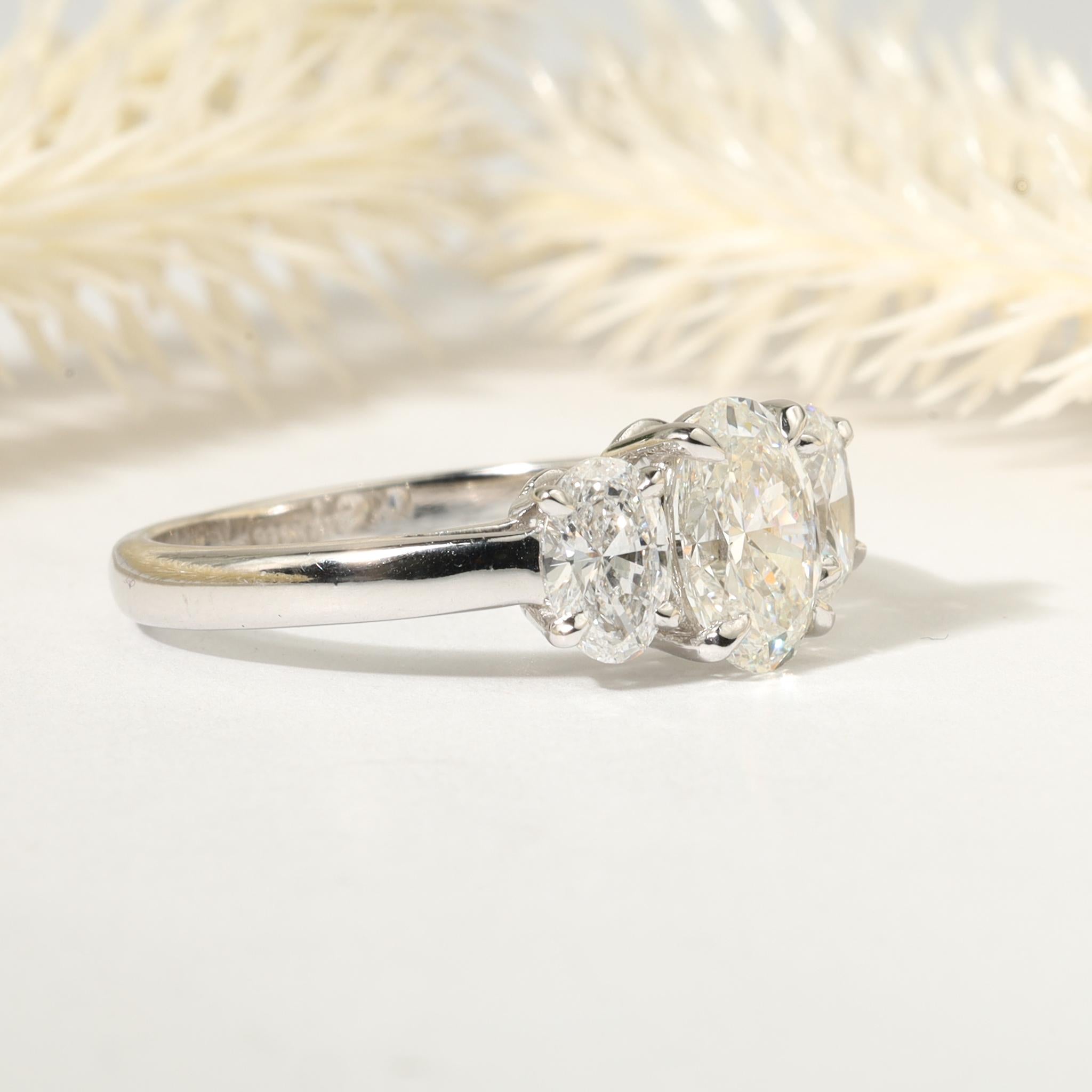 GIA Report Certified Oval Cut E VS 3 Stone 1.7 Carat  Diamond Ring 18k White In New Condition For Sale In Jaipur, RJ