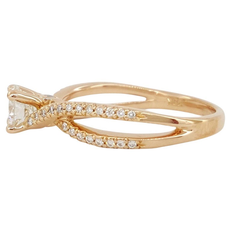 Rose Gold Round Brilliant Cut Diamond Crossover Engagement Ring. 



