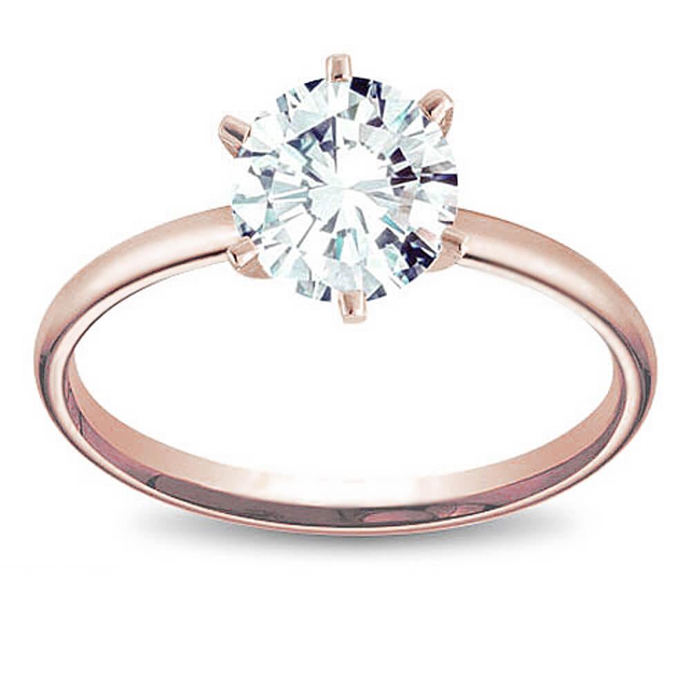 A timeless and feminine creation of fine jewelry, the Solitaire Diamond Engagement Ring is a true testament to engagement legacy and passion for diamonds. The simple setting enhances a diamond’s natural beauty and brilliance, without distraction. A