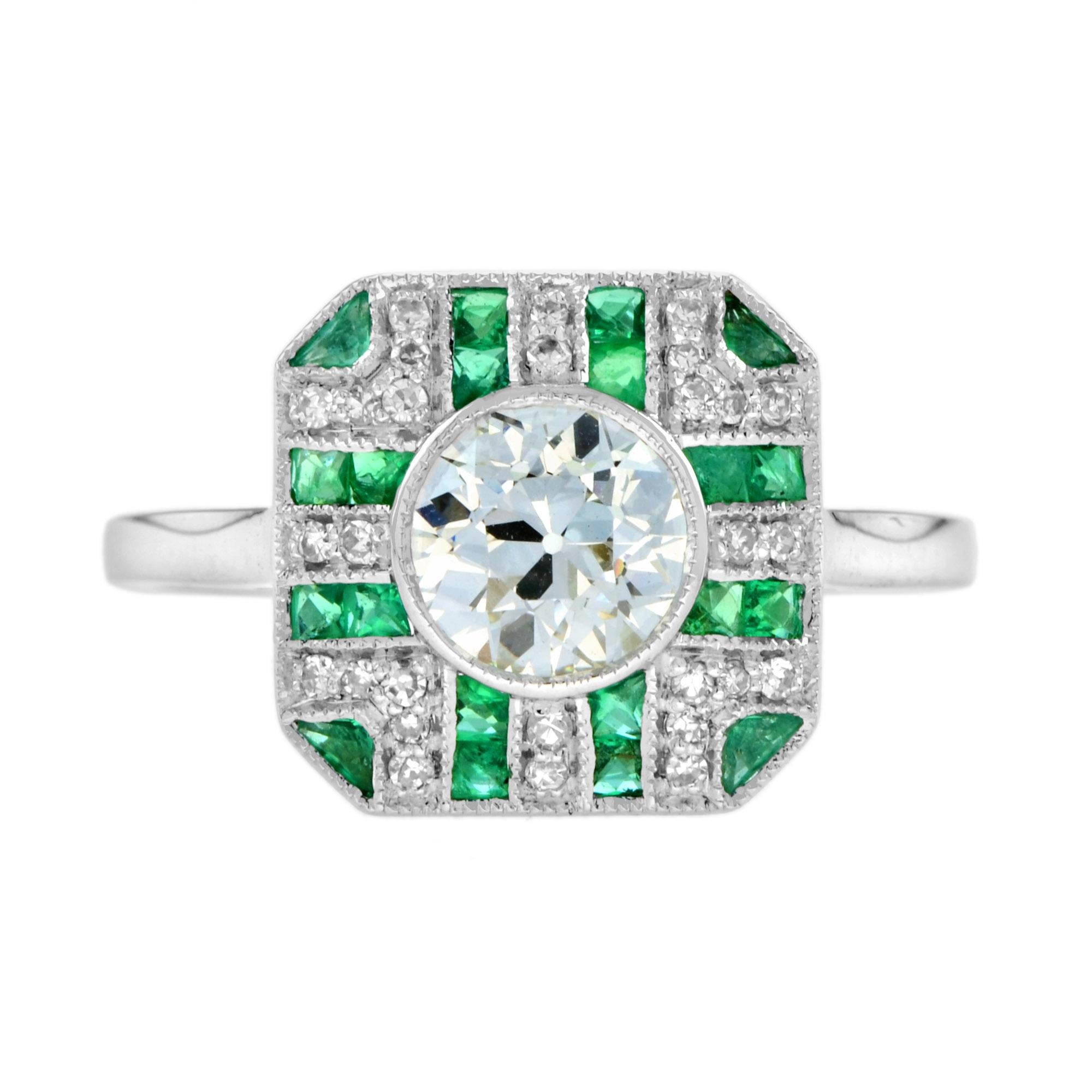 In this superb and stunning bright and shining old cut J color, VS2 clarity diamond, weighing 0.93 carats, beam brilliantly from within a striking octagon shaped setting accentuated all around with green French cut emeralds and diamonds.
Ring
