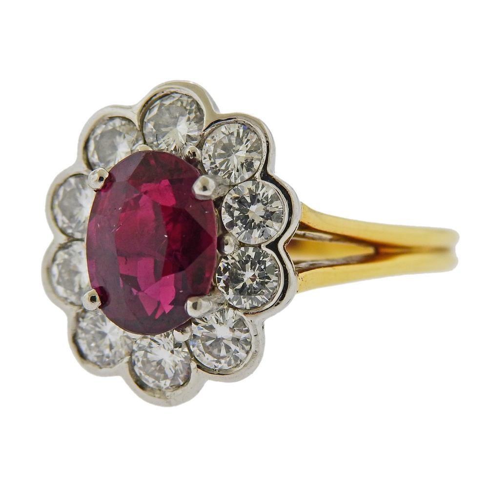 18k gold and platinum ring. Set with GIA certified ruby - 9.28 x 7.08 x 5.04mm, and diamonds approx. 1.00ctw. Measures - size 6, ring top is 16.4mm wide. Marked 18k Plat. Weight 6.8 grams. Comes with GIA #1176990126.