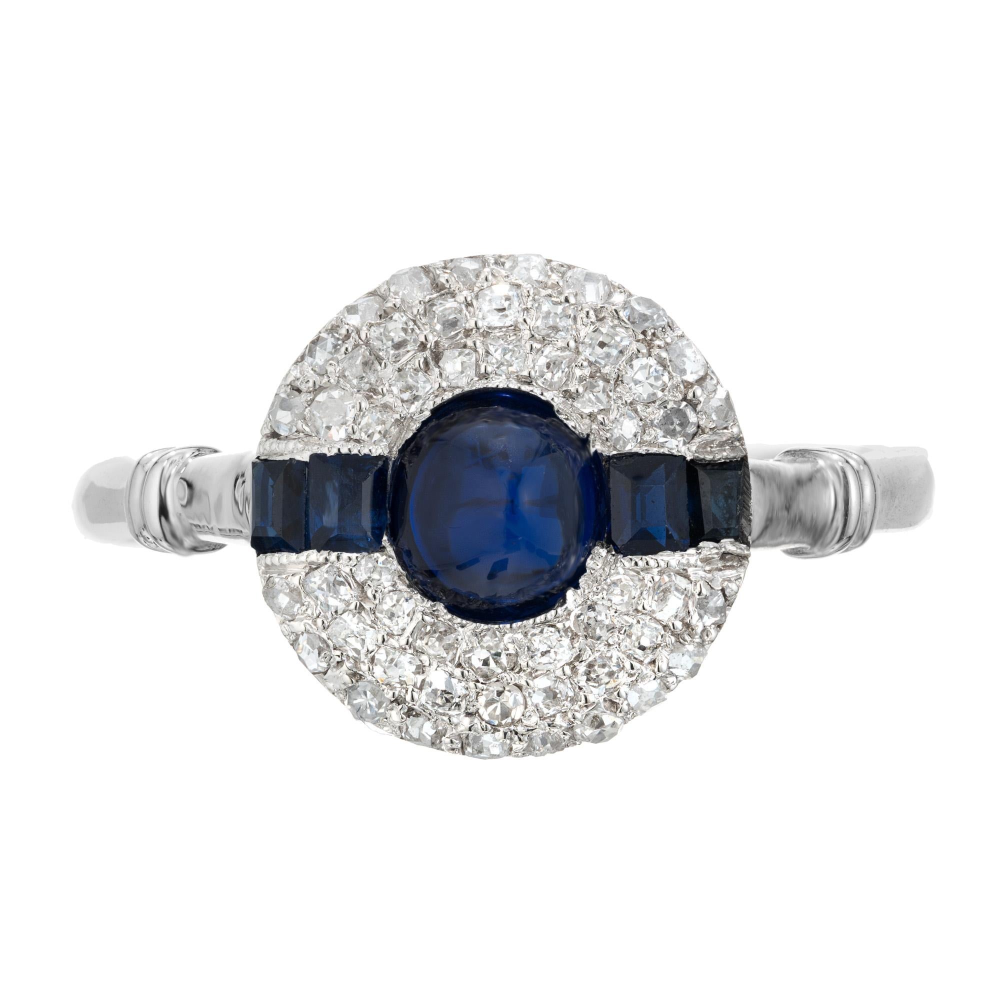 1920's Art Deco handmade sapphire and diamond engagement ring. GIA certified round, sugar loaf center sapphire, mounted in a platinum setting with a triple pave diamond cluster halo and 2 square cut sapphires on each side of the center stone. The