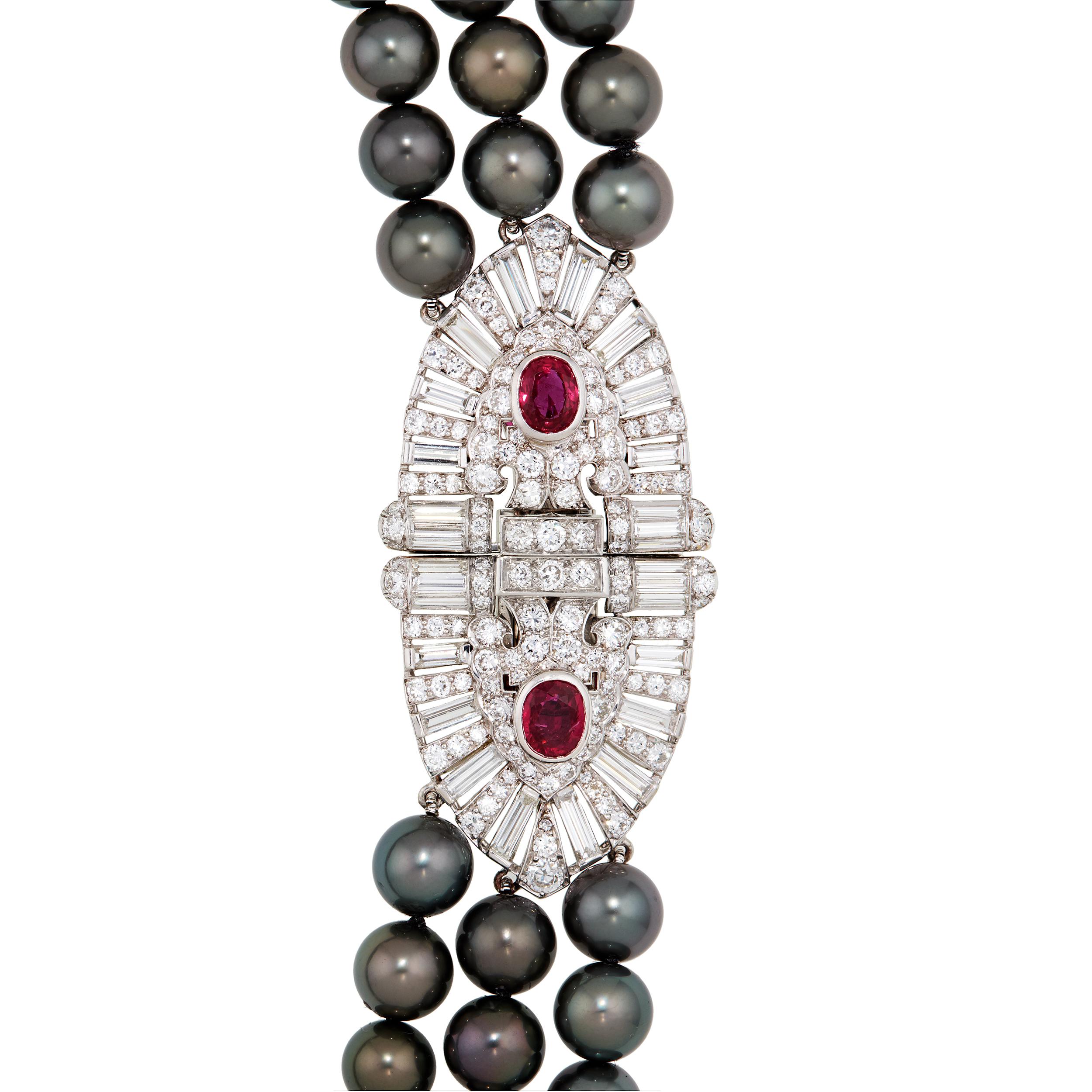 Painstaking attention to detail makes this piece nothing short of spectacular.  Three strands of Tahitian Pearls selected to fit the clasp with handmade platinum and diamond spacers to ensure the necklace lays perfectly on the neck.

(145 count) 8 -