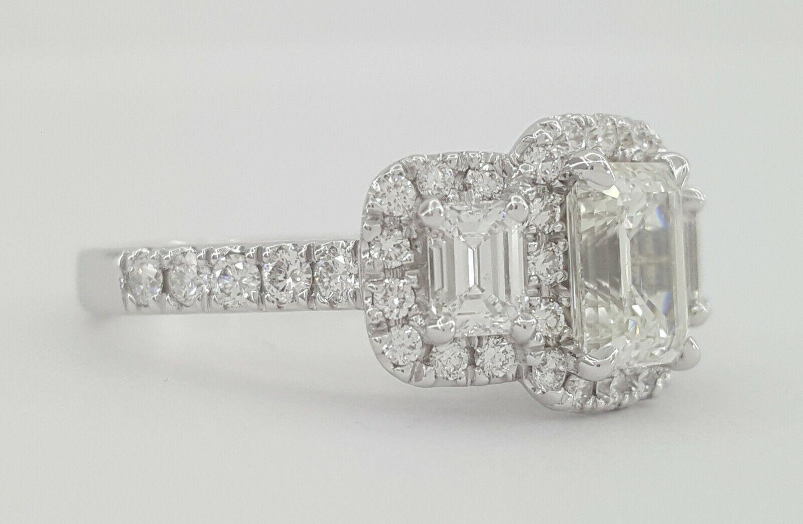 Modern GIA Three Stone 2.40 Carat White Gold Emerald Cut Diamond Engagement Halo Ring For Sale