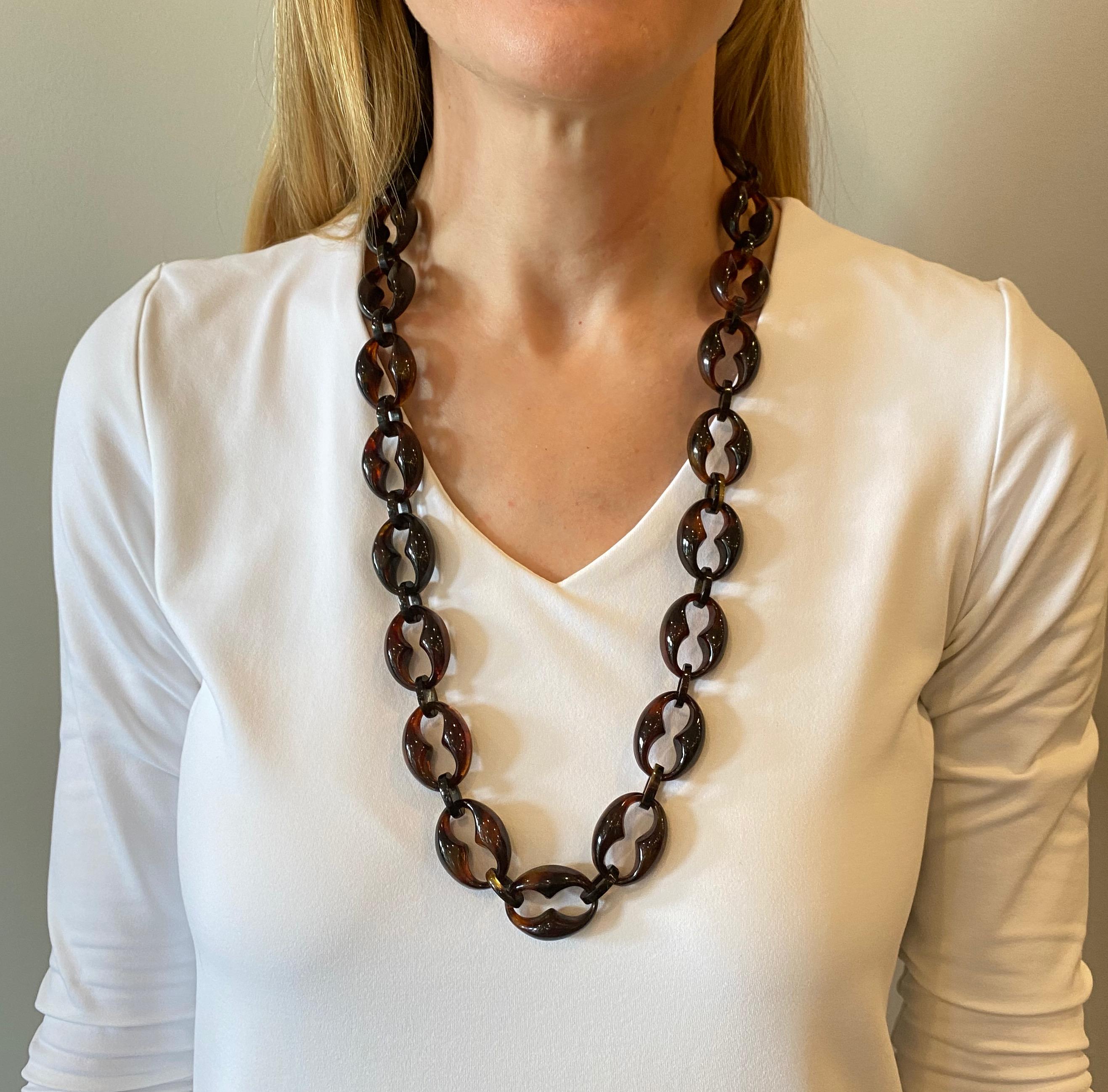 
GIA Report #6227026165

Carved Tortoise shell necklace with the original Gucci link design.

Attestation of age:  dates back to circa 1800s Victorian Era prior to the CITES ban of 1977. 

Measurements:

30.5