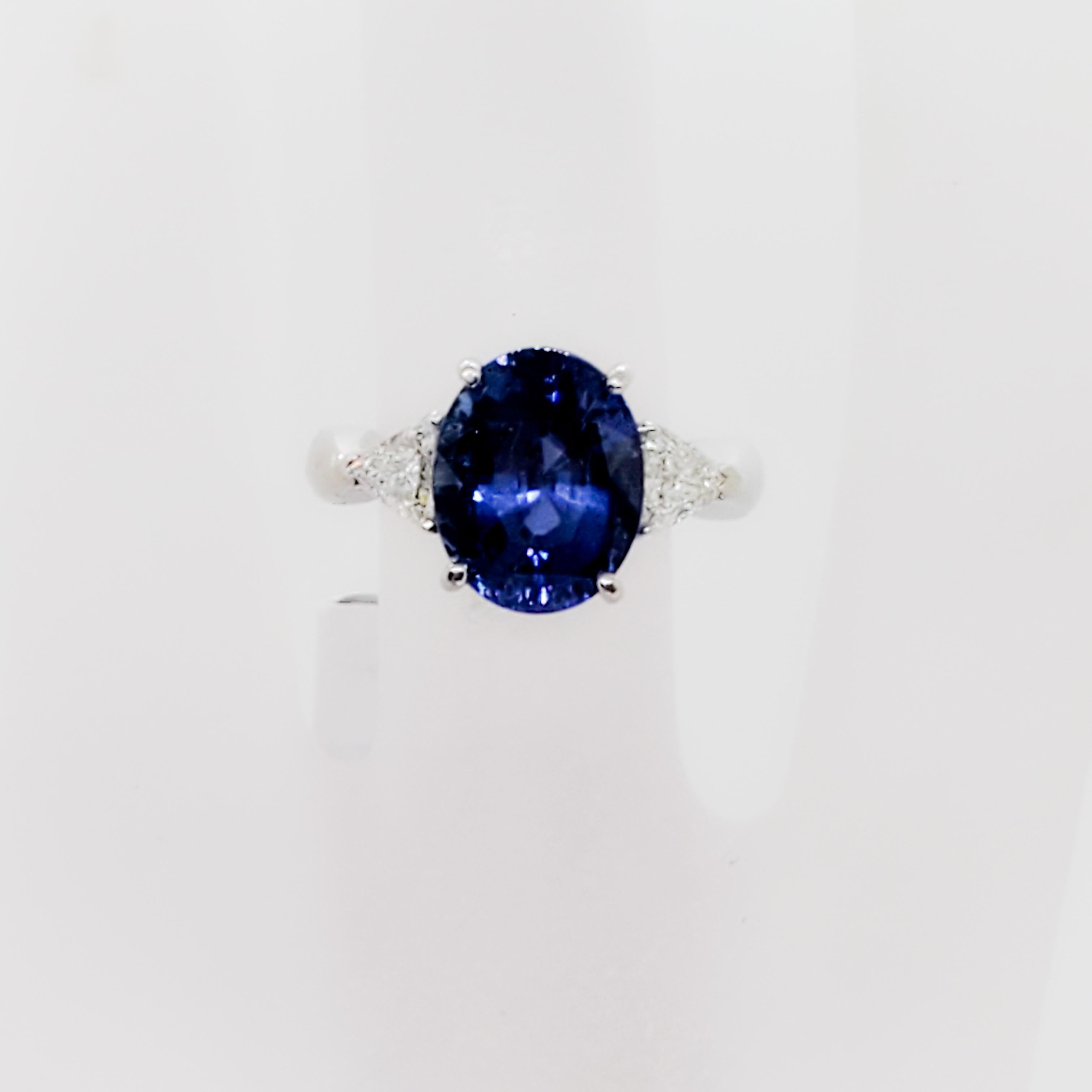 Oval Cut GIA Unheated Blue Sapphire Oval and White Diamond Three-Stone Ring