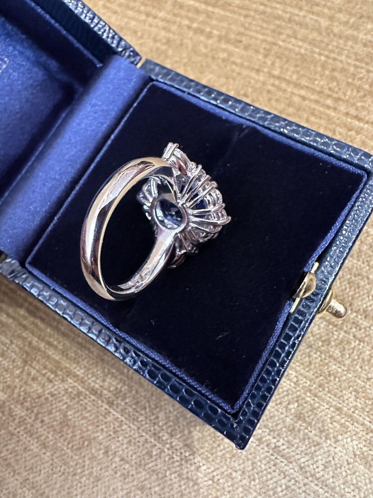 Women's GIA Unheated Ceylon Sapphire 7.65 Carat and Diamond Ring in Platinum For Sale
