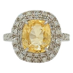 GIA-Cocktailring aus Platin mit unerhitztem orange-gelbem Saphir und weißem Diamant