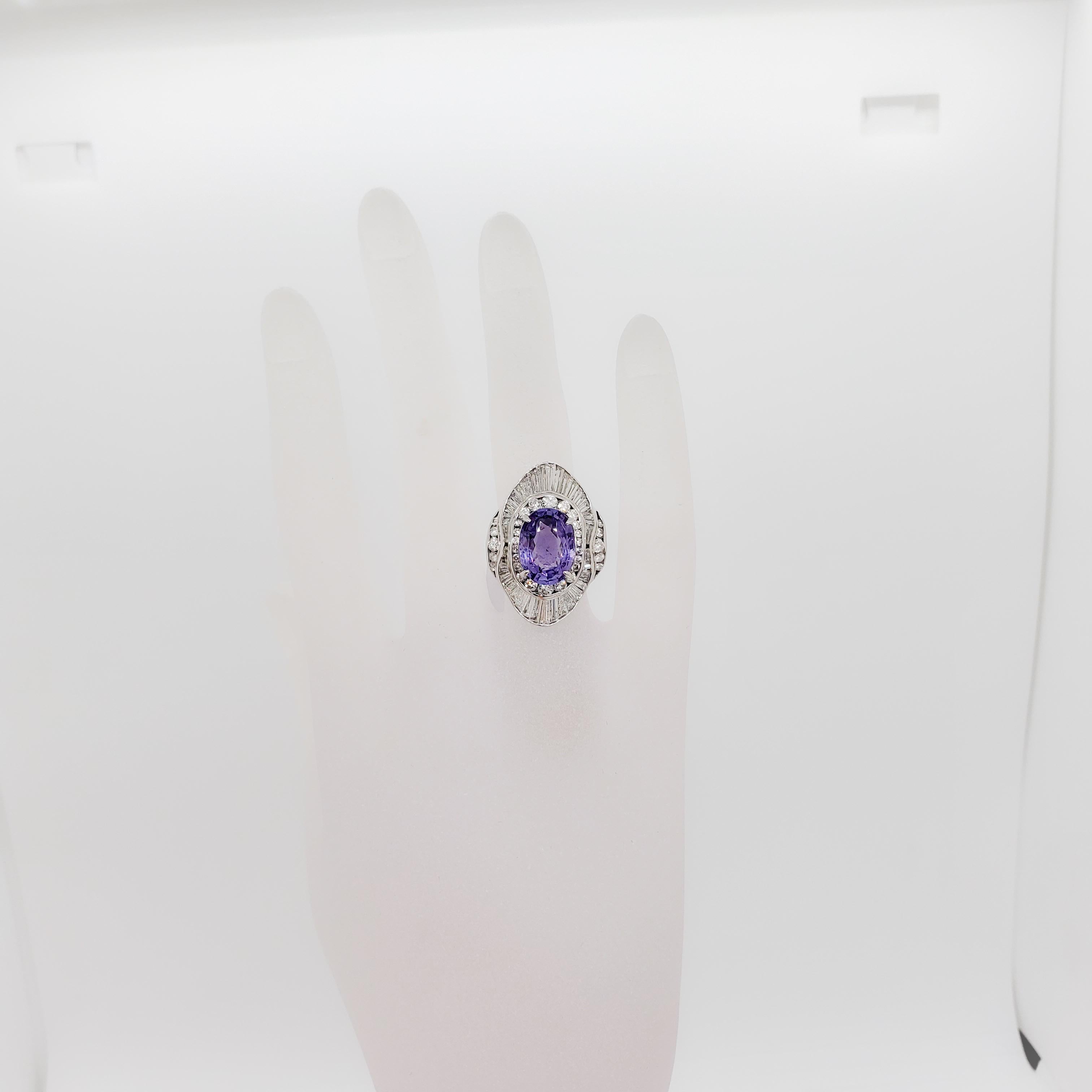 Gorgeous 5.15 ct. Sri Lanka purple Ceylon sapphire modified brilliant oval with 2.28 ct. good quality white diamond rounds and baguettes.  Handcrafted platinum mounting. GIA certificate included.  Purple sapphire is no heat.  Ring size 6.