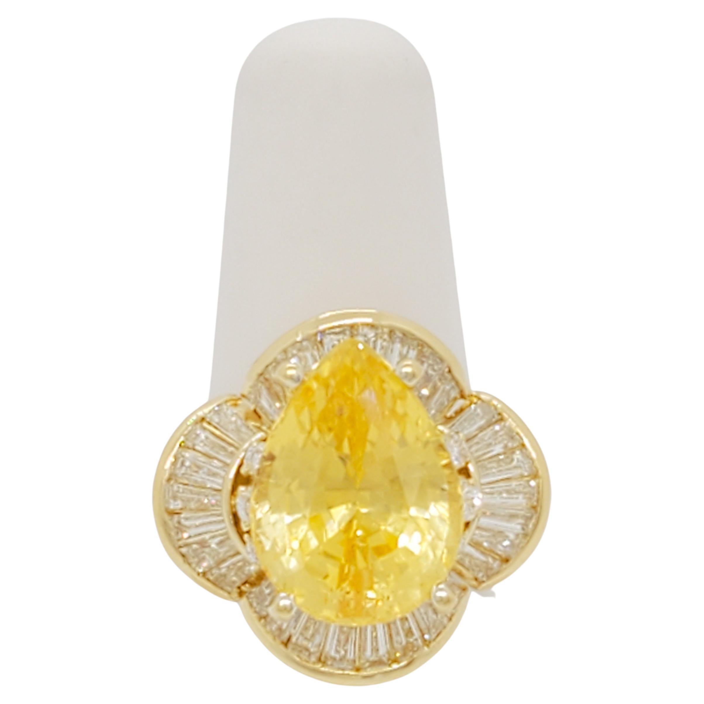 Stunning 9.00 ct. GIA certified unheated Sri Lanka yellow sapphire pear shape with good quality white diamond baguettes and rounds.  Handmade in 18k yellow gold.  Ring size 5.  GIA certificate included.
