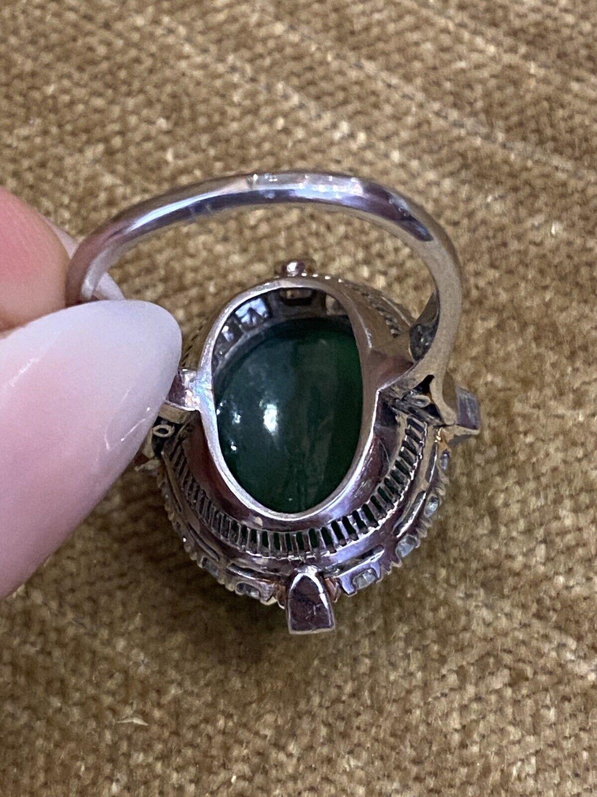 GIA Untreated Jade Oval Cabochon and Diamond Vintage Platinum Ring In Good Condition For Sale In La Jolla, CA