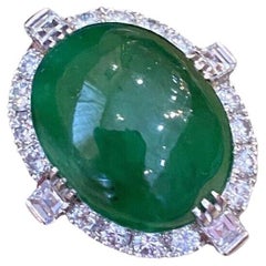 GIA Untreated Jade Oval Cabochon and Diamond Vintage Platinum Ring