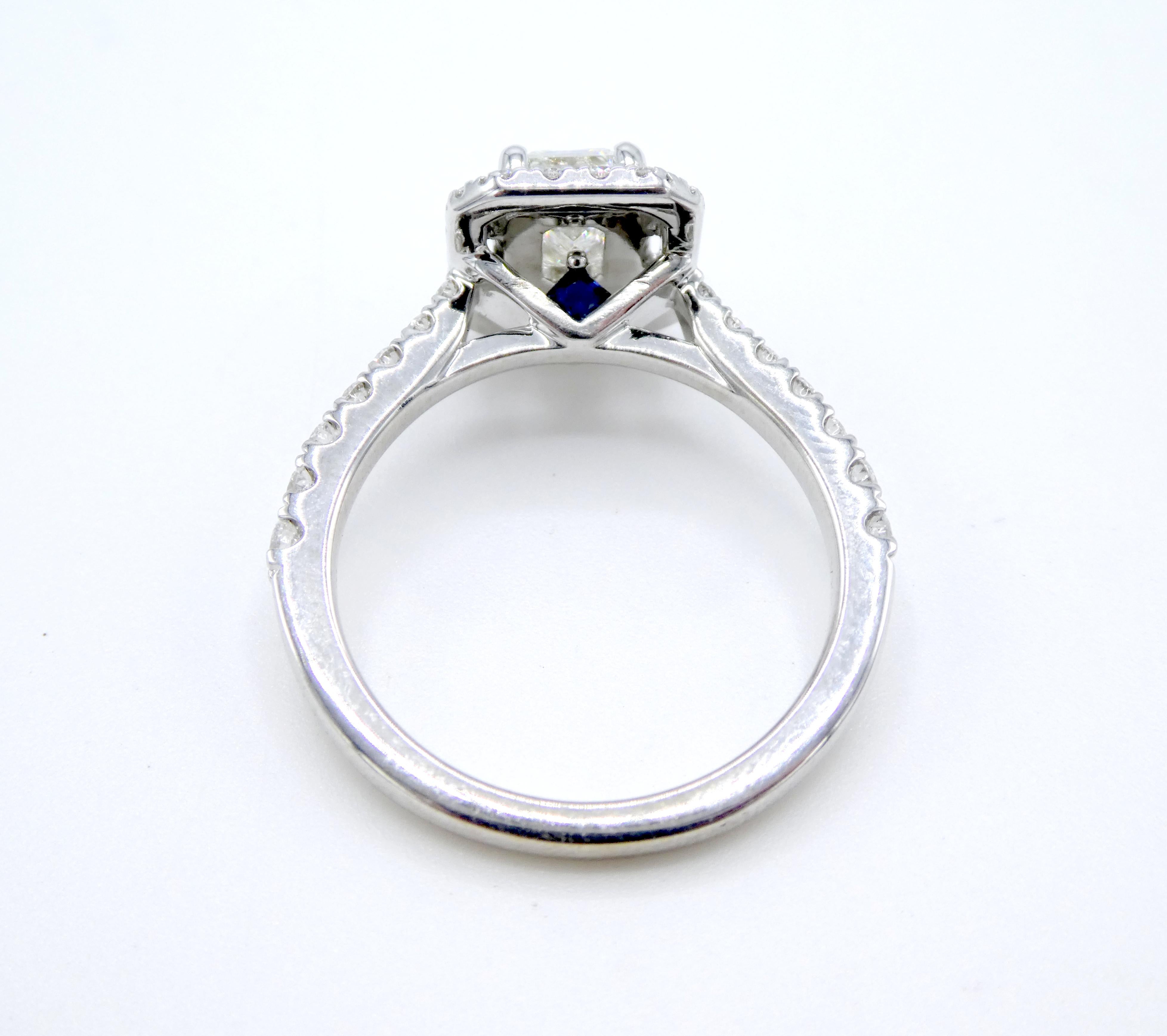 Modern GIA Vera Wang 0.80 Carat Emerald Cut Diamond 14 Karat White Gold Halo Ring