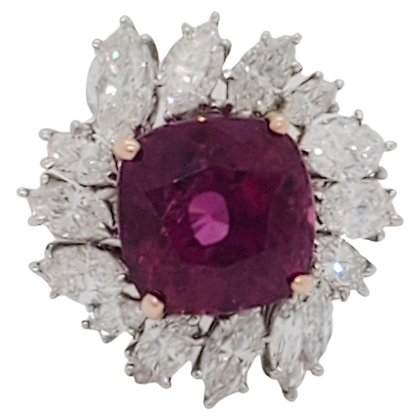Breathtakingly gorgeous 9.09 ct. GIA certified Vietnamese red ruby cushion with fine quality white diamond marquise shapes.  Handmade in platinum and 18k rose gold.  Ring size 5.25.  GIA certificate included.