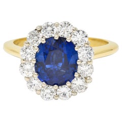 GIA Vintage 3.25 Carats Sapphire Diamond 18 Karat Two-Tone Vintage Halo Ring