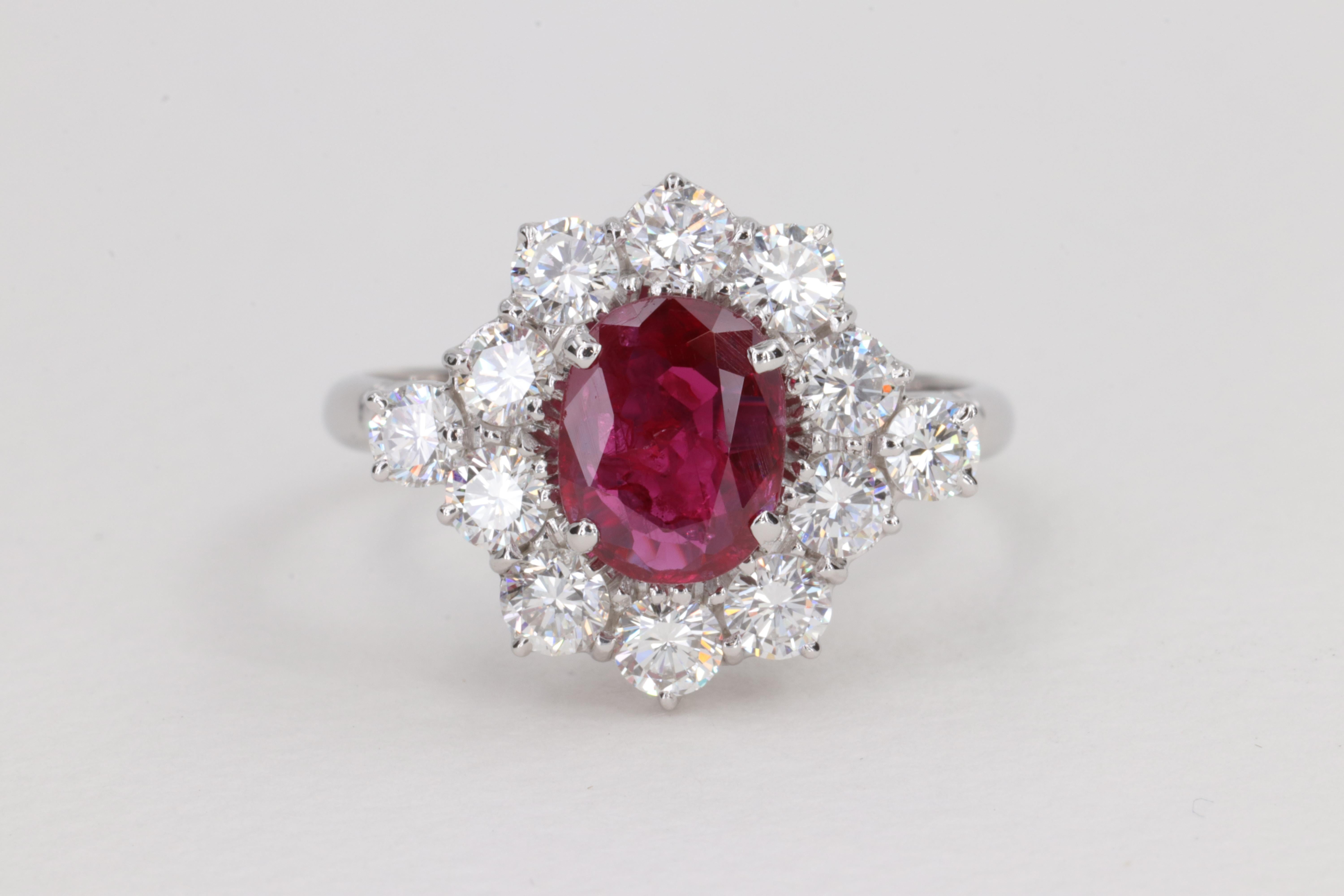 G.I.A. Vivid Red Ruby and Diamond Halo Handmade Ring
 
Ruby - Natural

Weight - 1.16 Carats 
Measurements - 7.78 x 6.13 x 2.61
Shape - Oval 
Treatment - Heated
Origin - Thailand
G.I.A. Report # 1226483504

Ring:

Diamonds - Natural - 12 Round