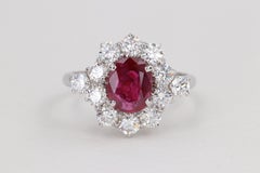 G.I.A. Vivid Red Ruby and Diamond Halo Handmade Ring