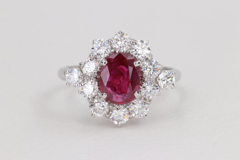 G.I.A. Vivid Red Ruby and Diamond Halo Handmade Ring For Sale at 1stDibs