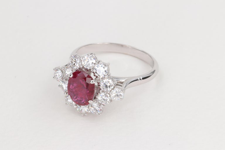 G.I.A. Vivid Red Ruby and Diamond Halo Handmade Ring For Sale at 1stDibs