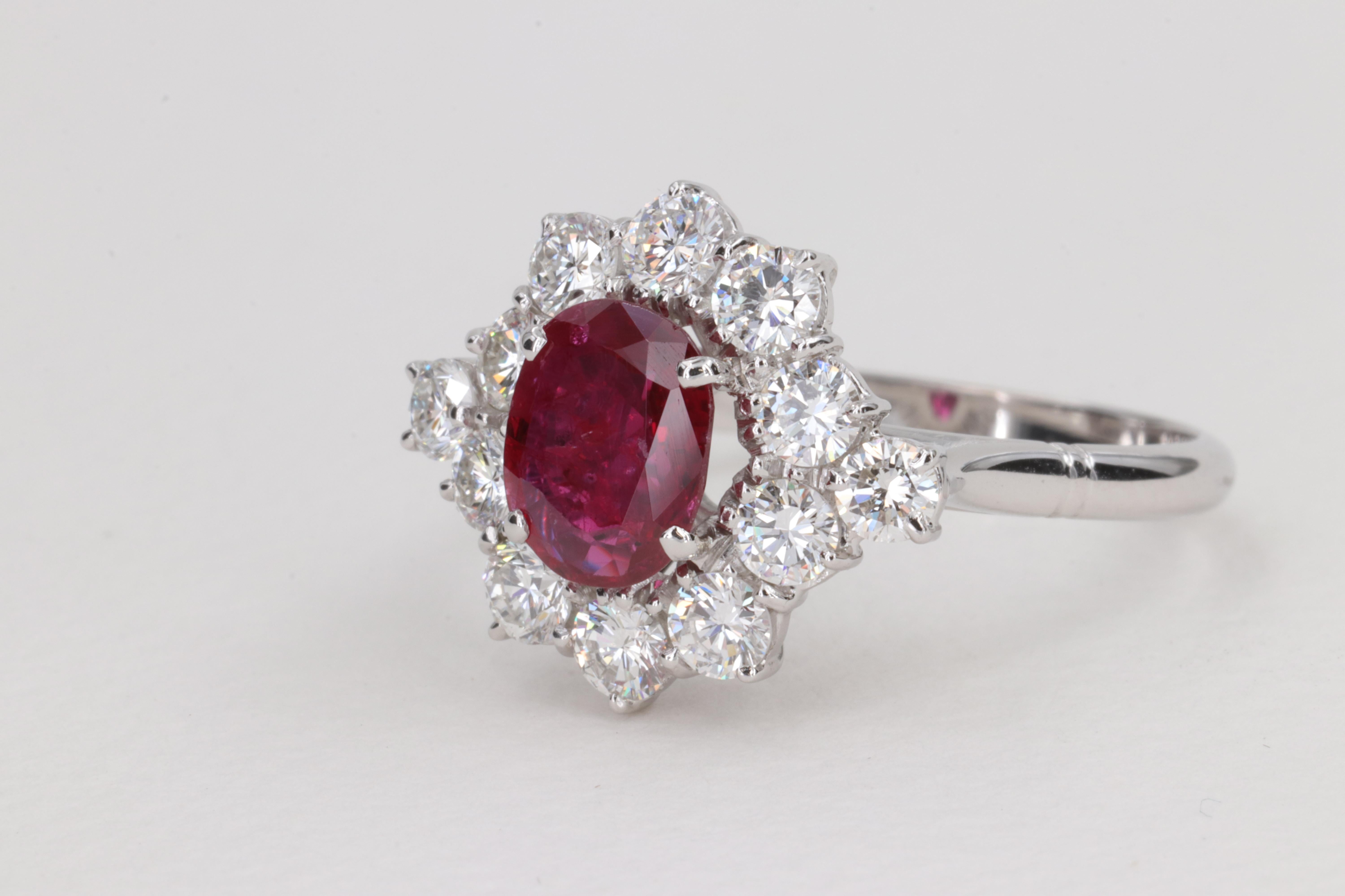 G.I.A. Vivid Red Ruby and Diamond Halo Handmade Ring In Excellent Condition For Sale In Tampa, FL