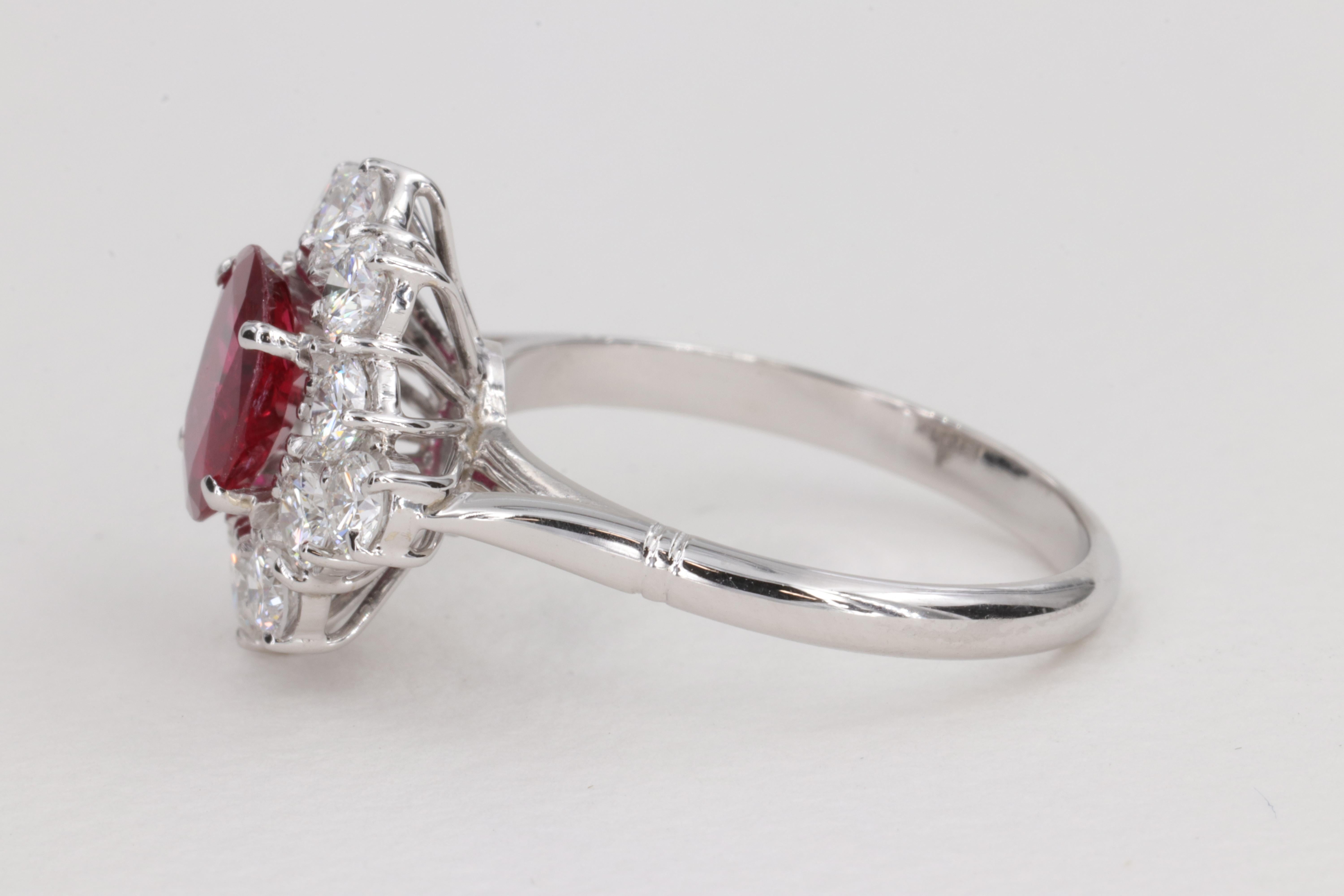 G.I.A. Vivid Red Ruby and Diamond Halo Handmade Ring For Sale 1