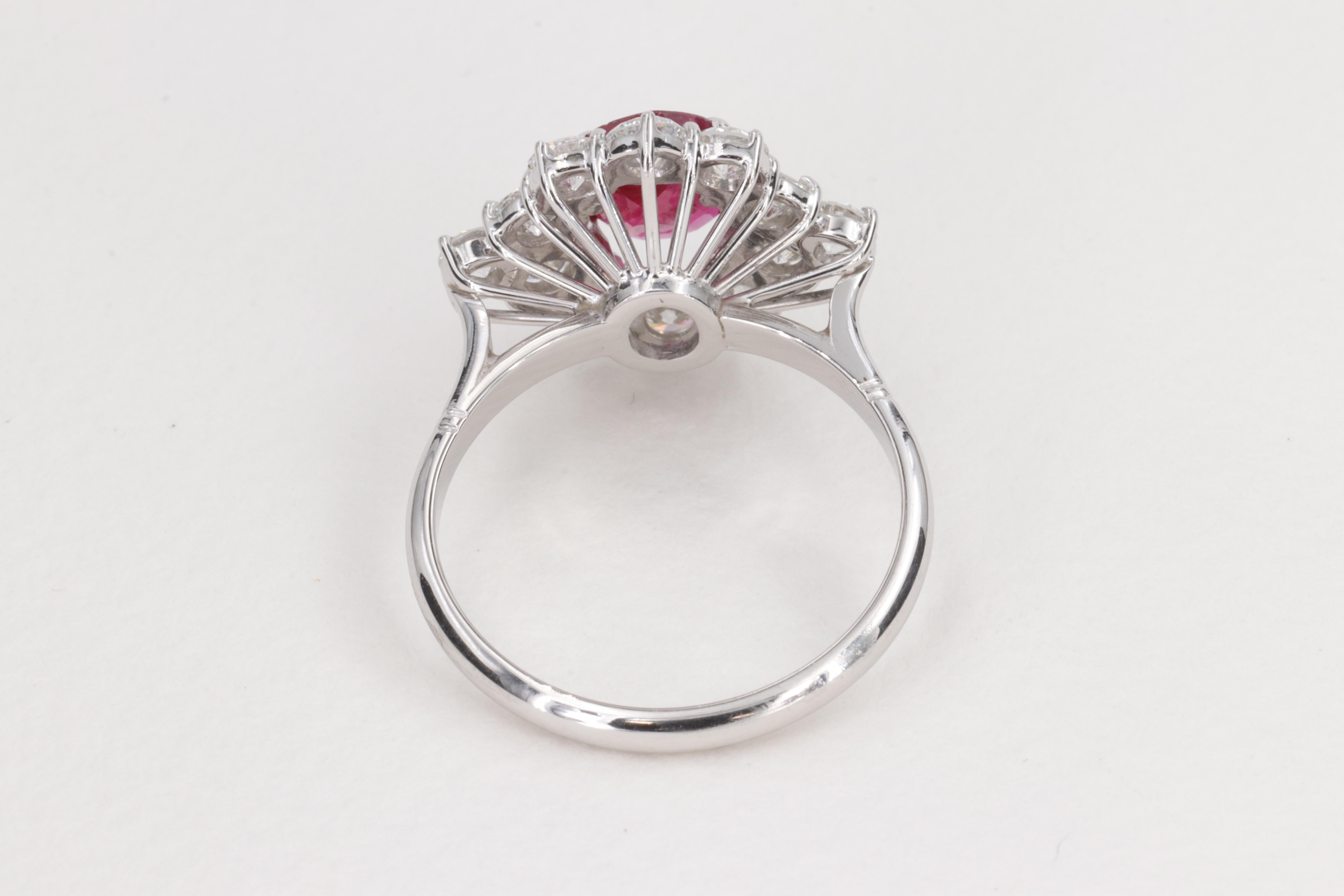 G.I.A. Vivid Red Ruby and Diamond Halo Handmade Ring For Sale 3