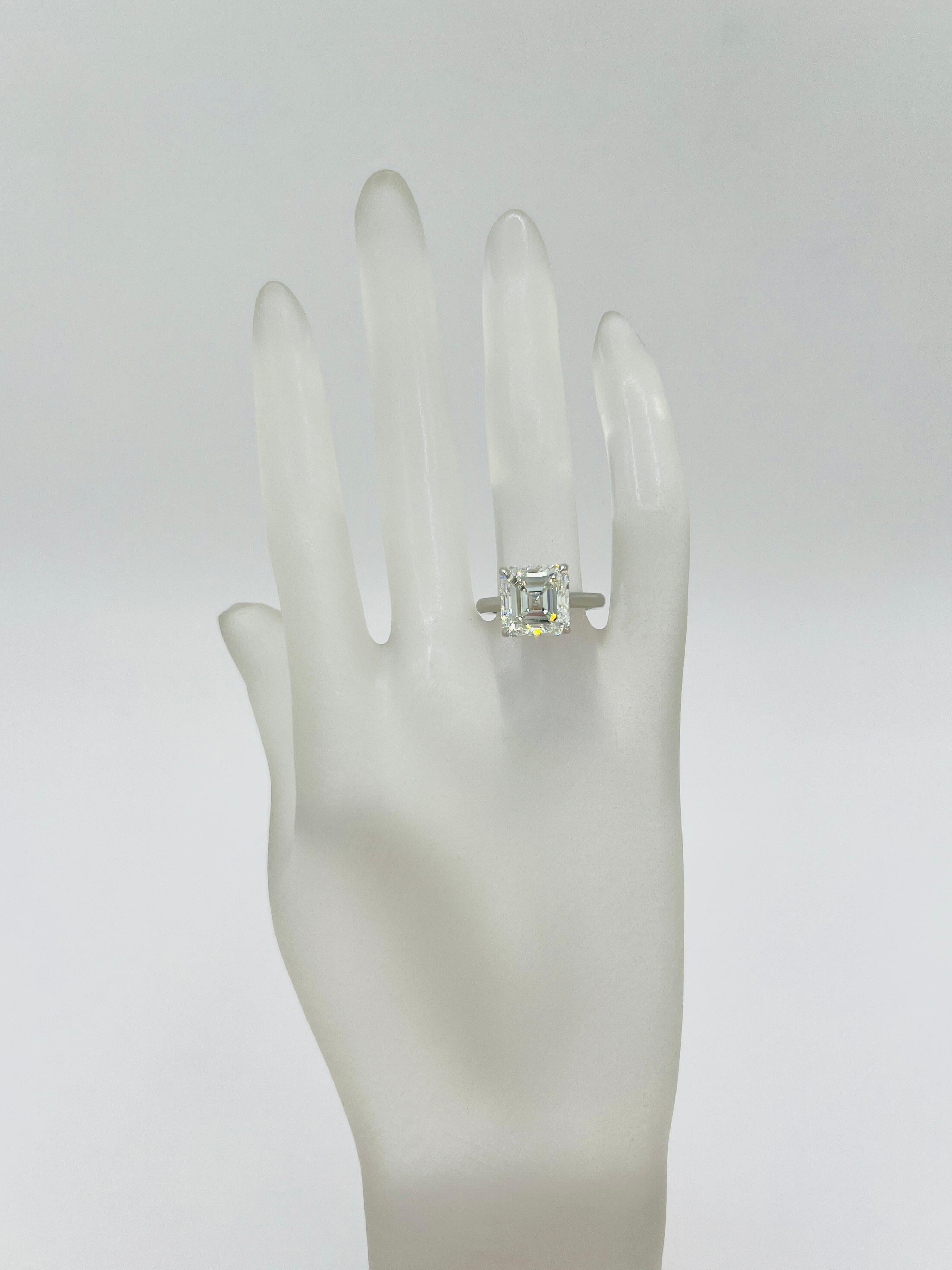 GIA White Diamond 6 Carat Asscher Cut Solitaire Ring in Platinum In New Condition For Sale In Los Angeles, CA