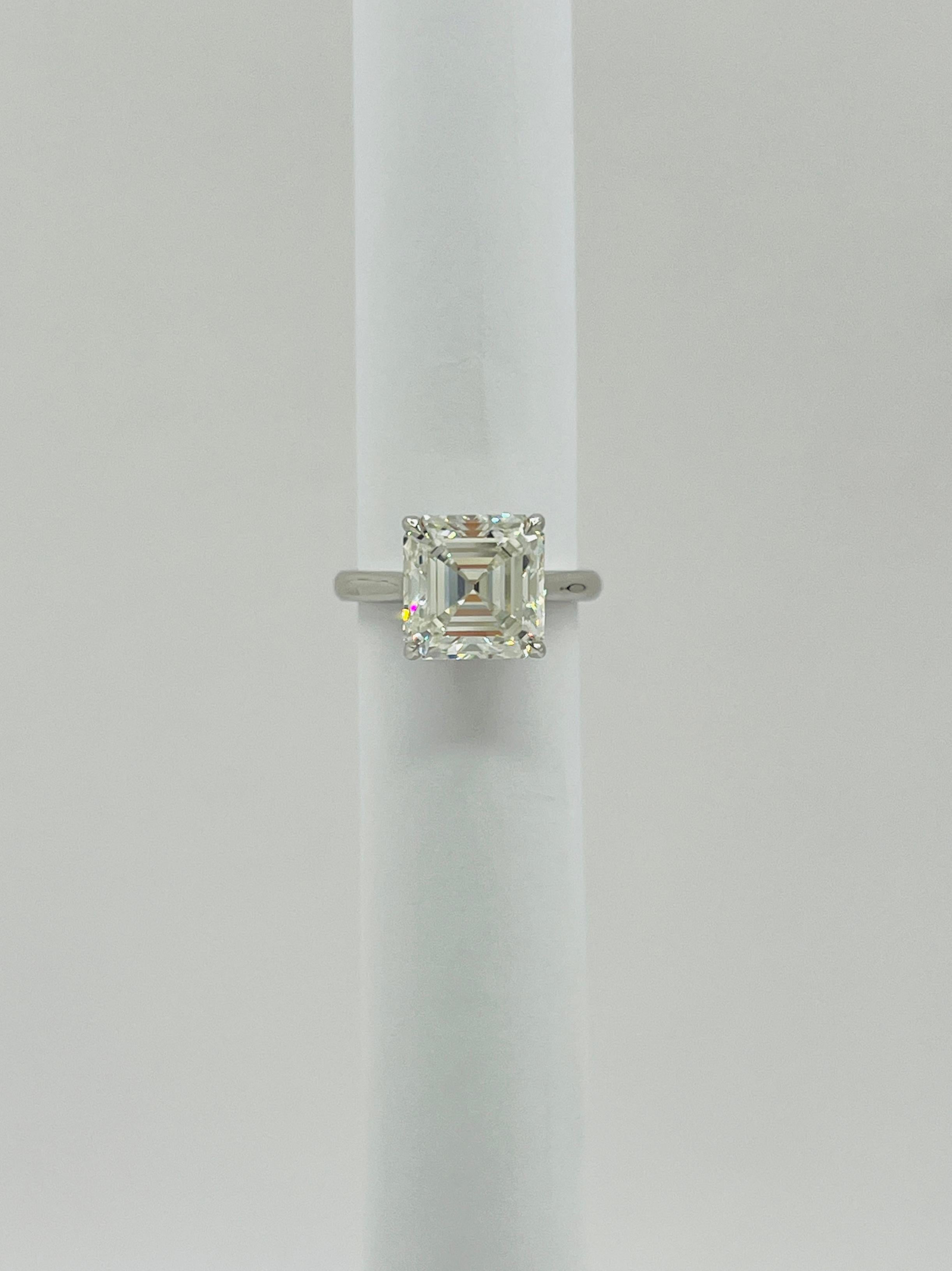 GIA White Diamond 6 Carat Asscher Cut Solitaire Ring in Platinum For Sale 3