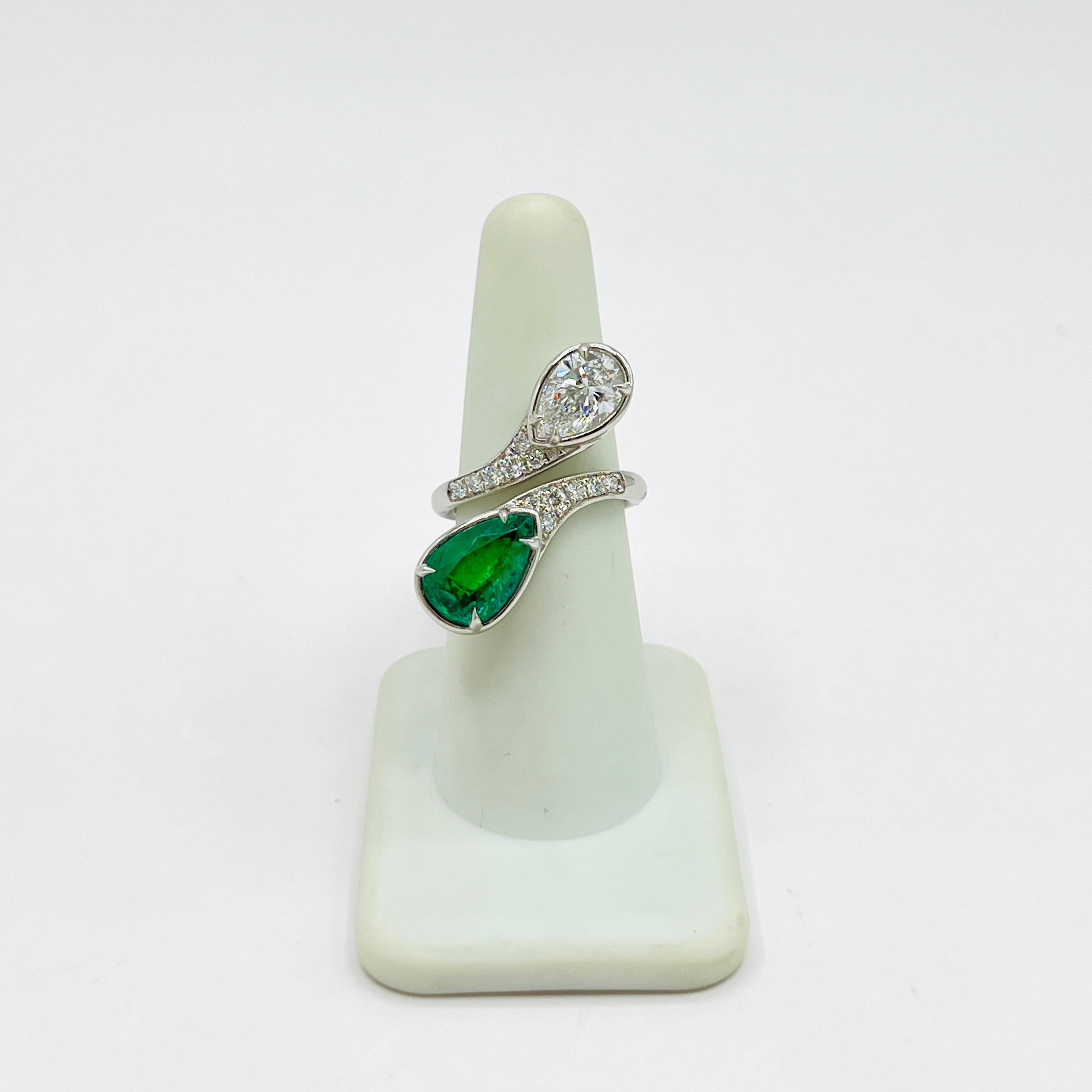 GIA White Diamond and Emerald Bypass Ring in Platinum For Sale 1