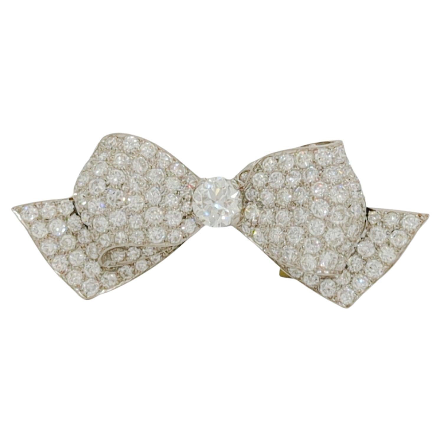 GIA White Diamond Bow Design Brooch in Platinum For Sale