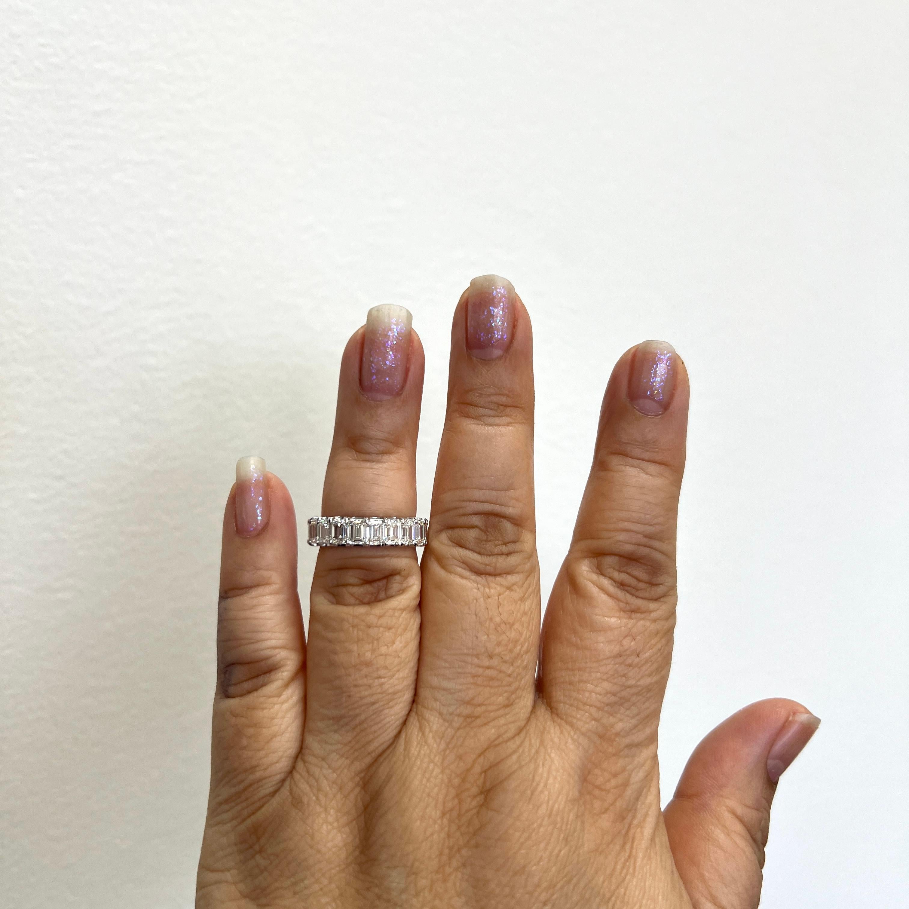 Beautiful 6.00 ct. GHI VVS-VS white diamond emerald cuts.  Total of 20 stones.  Handmade in 18k white gold.  Ring size 6.5.  Each stone comes with a GIA certificate.