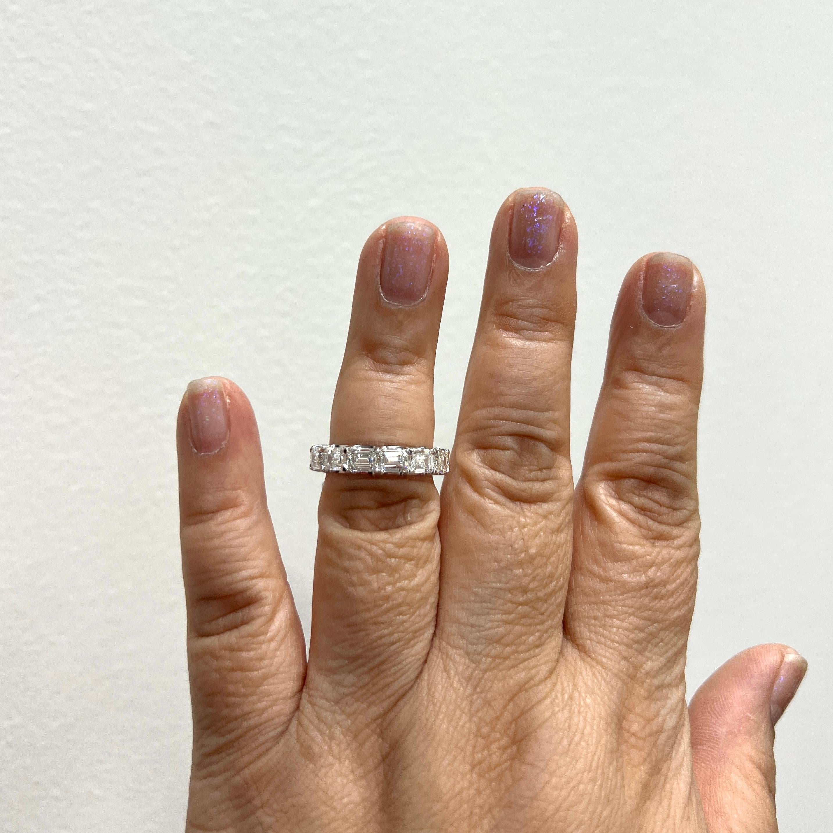 Gorgeous 5.66 ct. HI IF-VS2 white diamond emerald cuts.  Total of 14 stones, each one is 0.40 ct.  Handmade in 18k white gold.  Ring size 6.5.  GIA certificates included.
