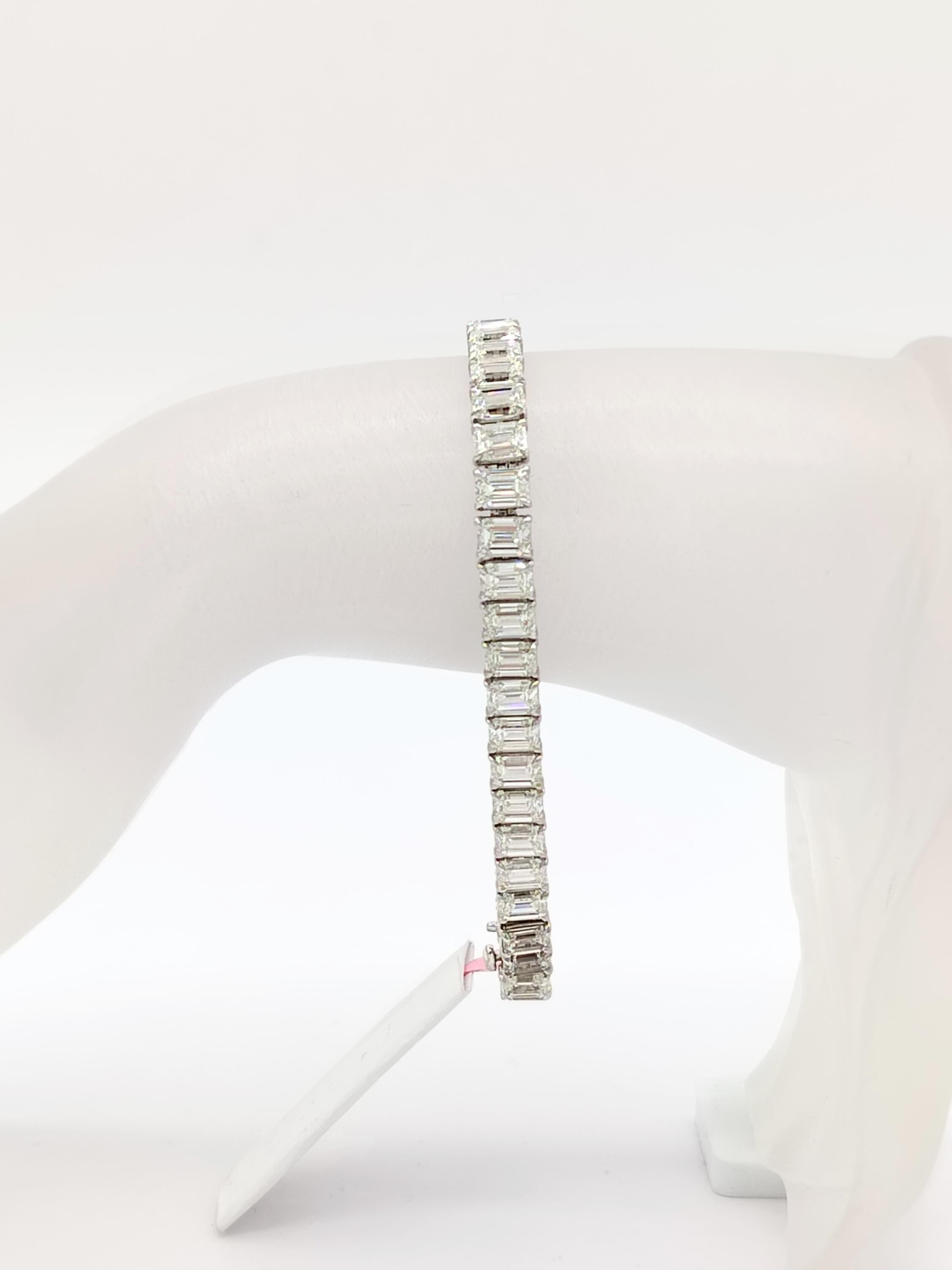 Gorgeous 18.45 ct. HIJ IF VS2 white diamond emerald cut tennis bracelet.  Total of 46 stones.  Handmade in 18k white gold.  Length is 7