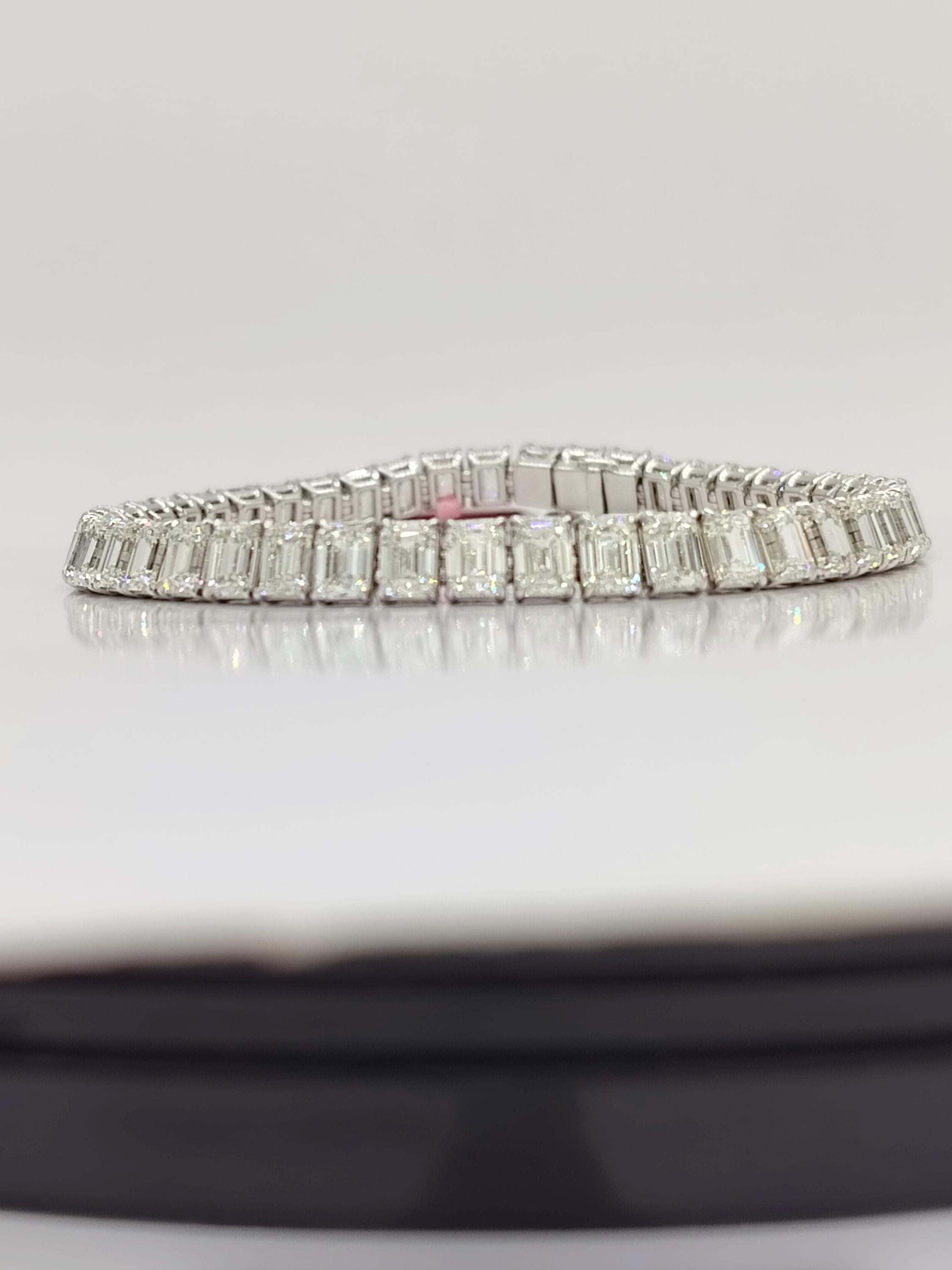 Women's or Men's GIA White Diamond Emerald Cut Tennis Bracelet in 18K White Gold For Sale