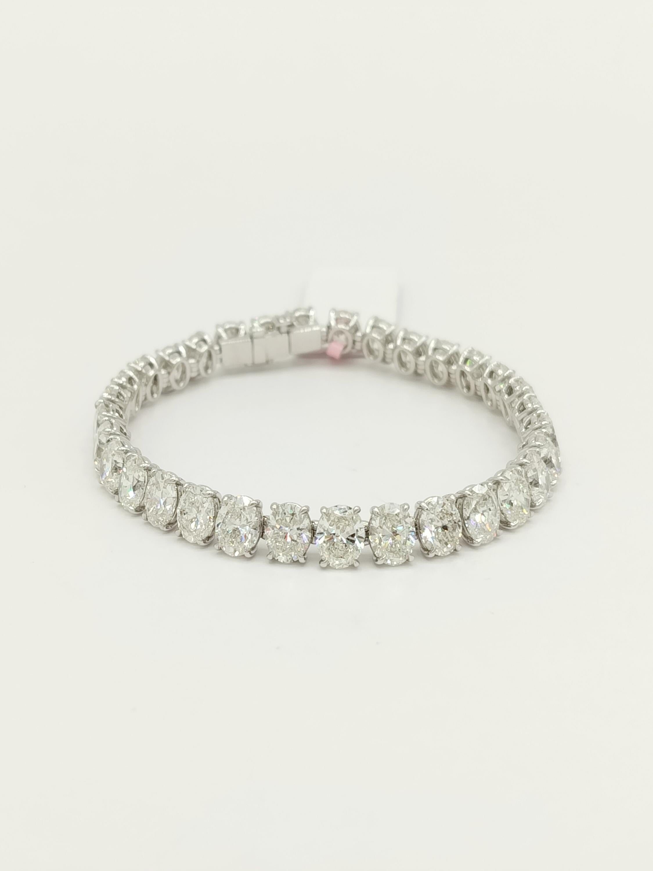 Women's or Men's GIA White Diamond Oval Tennis Bracelet in 18K White Gold For Sale