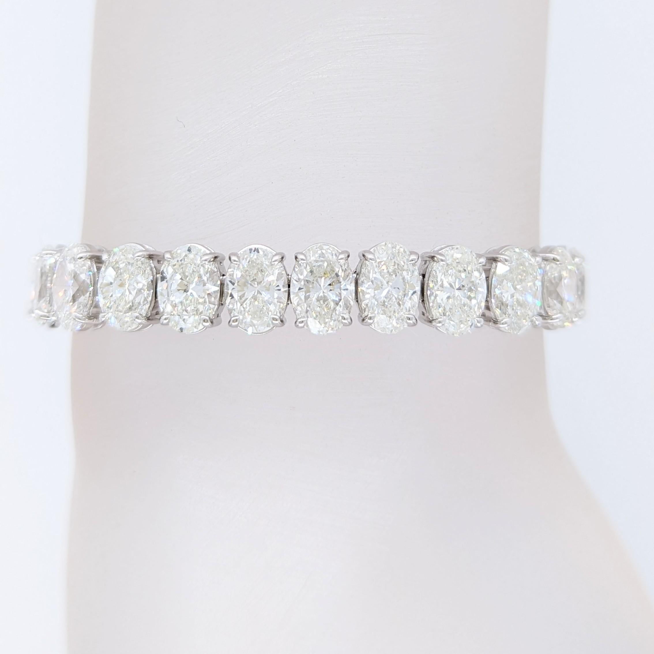Absolutely stunning 31.18 ct. EFG SI1-SI2 white diamond ovals bracelet.  Each stone is about 1 carat with a total of 31 stones.  Handmade in platinum.  Length is 7