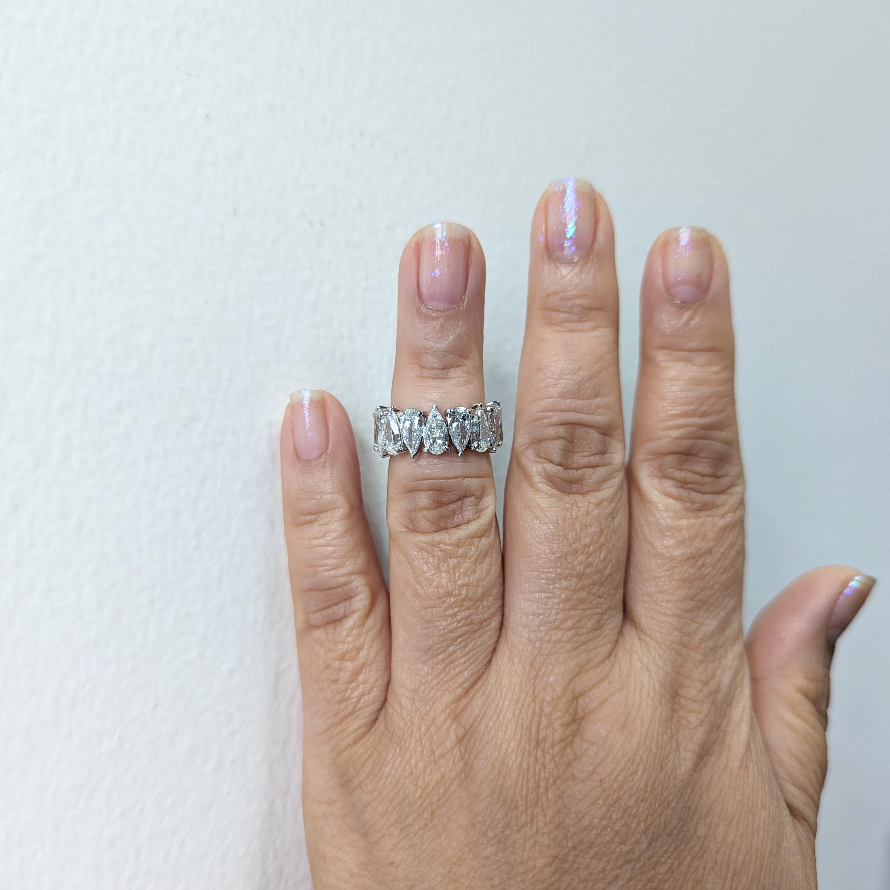 Amazing pear shape eternity band with 8.03 ct. GHI SI1-SI2 diamonds.  Total of 16 stones.  Handmade in 18k white gold.  GIA certificates are included.  Ring size 6.